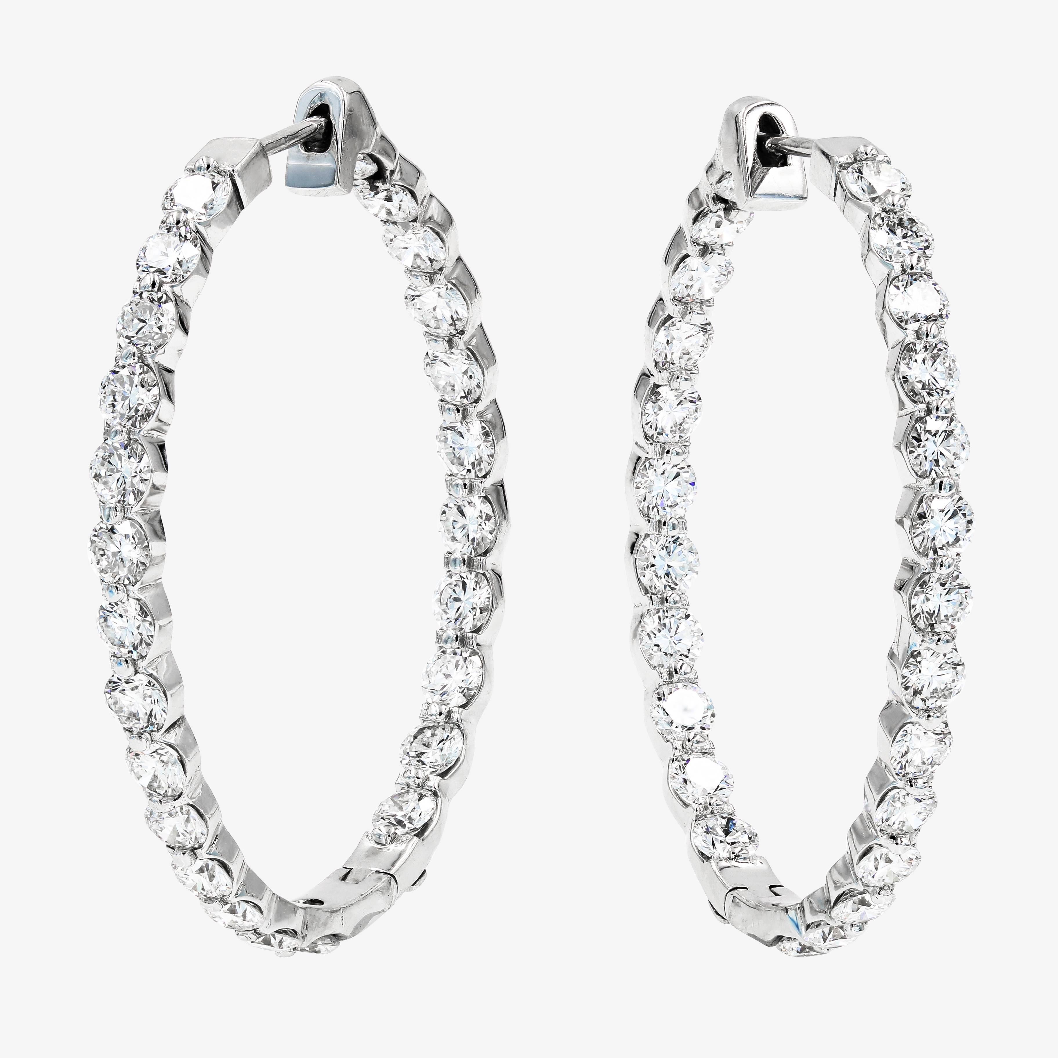 Lester Lampert original hoop earrings are set with 50 ideal cut round diamonds= 6.84cts. t.w. (the diamonds are G in color and VS in clarity) in 18kt. white gold

Every Lester Lampert piece will arrive in an elegant custom jewelry box.