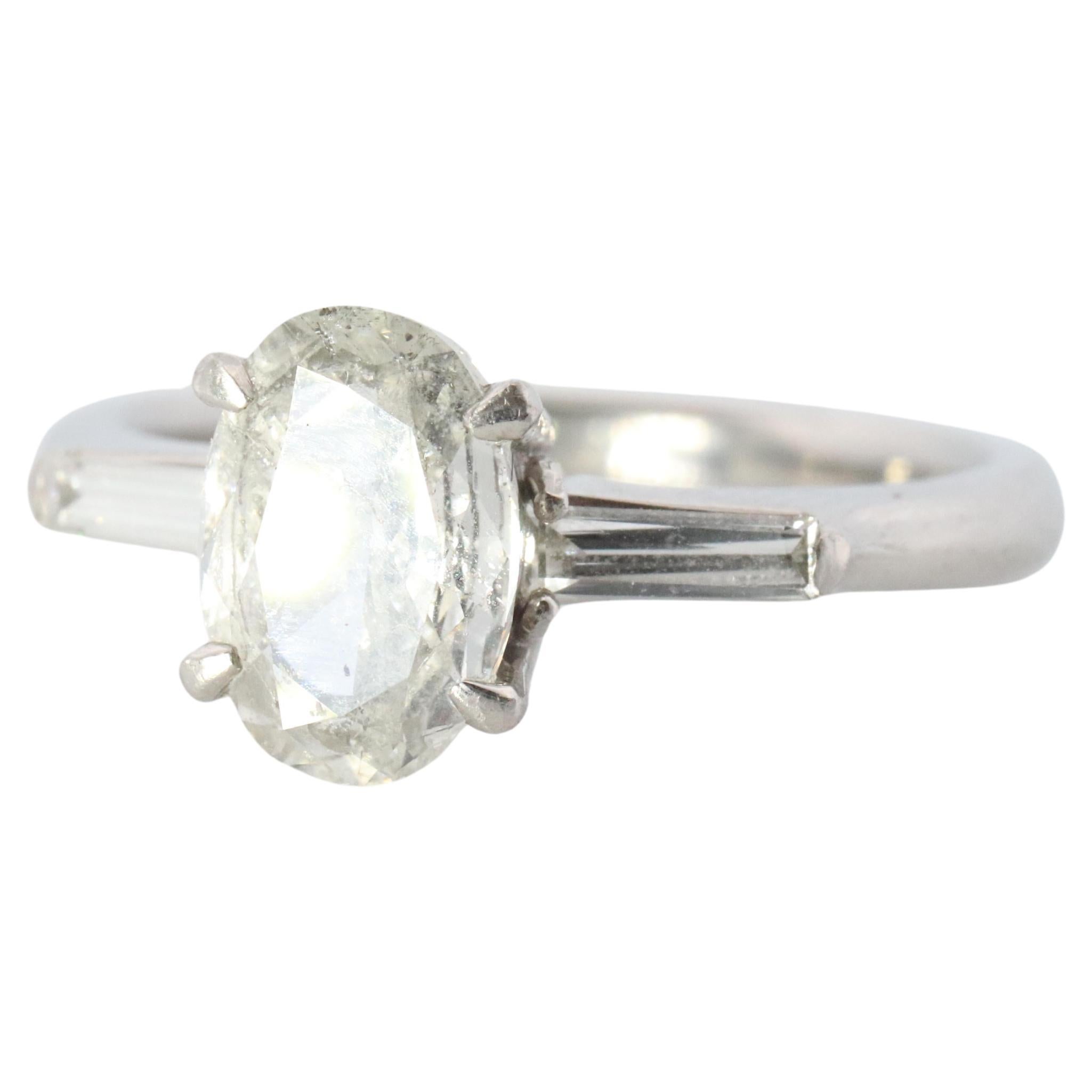 LARGE Diamond Oval engagement ring. Platinum 1CT Oval Diamond Solitaire baguette For Sale
