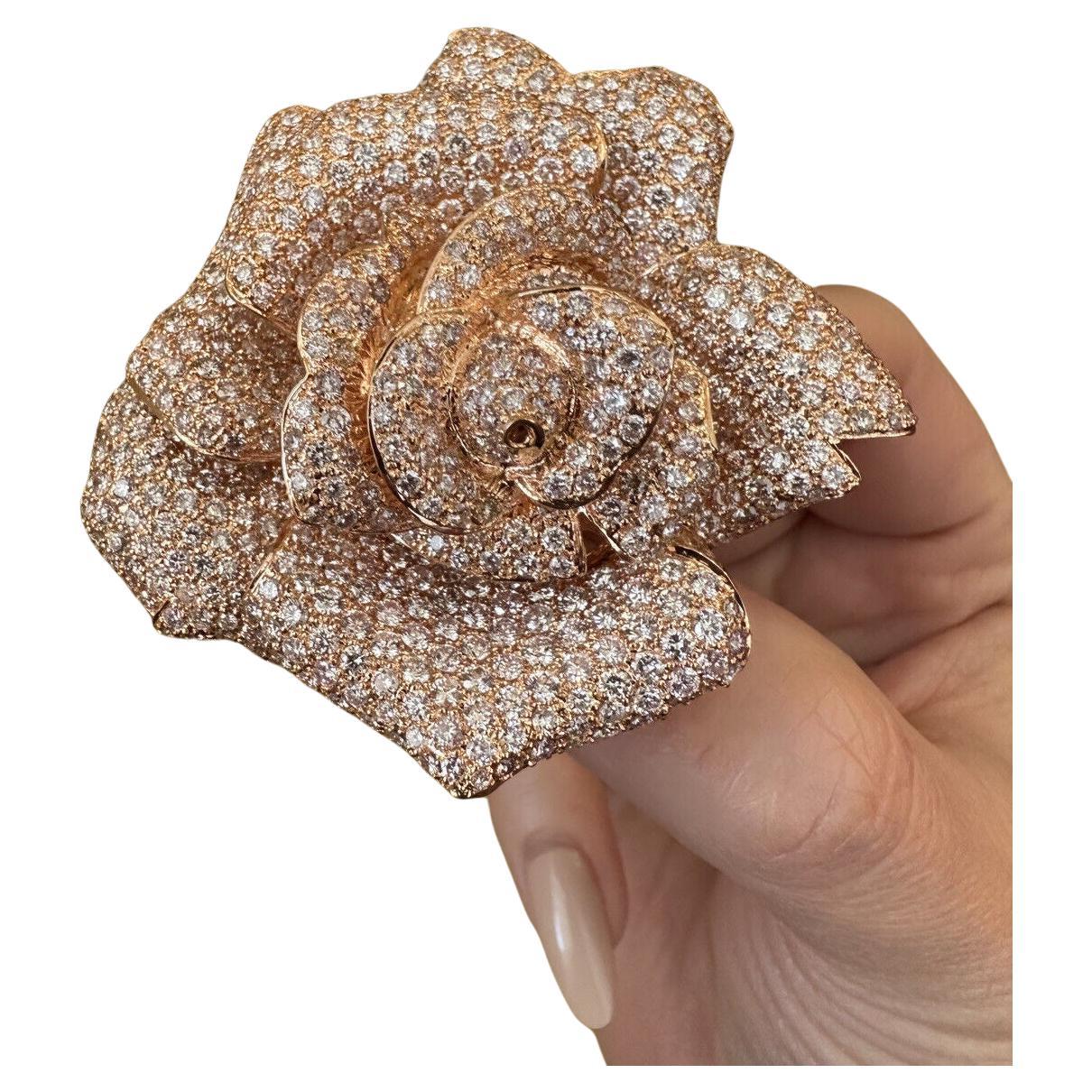 Large Diamond Rose Brooch/Pin/Pendant 22.00 Carat Total Weight in 18k Rose Gold

Large Flower Brooch in 18k Rose Gold features 22.15 carats of Round Brilliant Diamonds pave-set in 18k Rose Gold. The diamonds are bright and lively.

This versatile