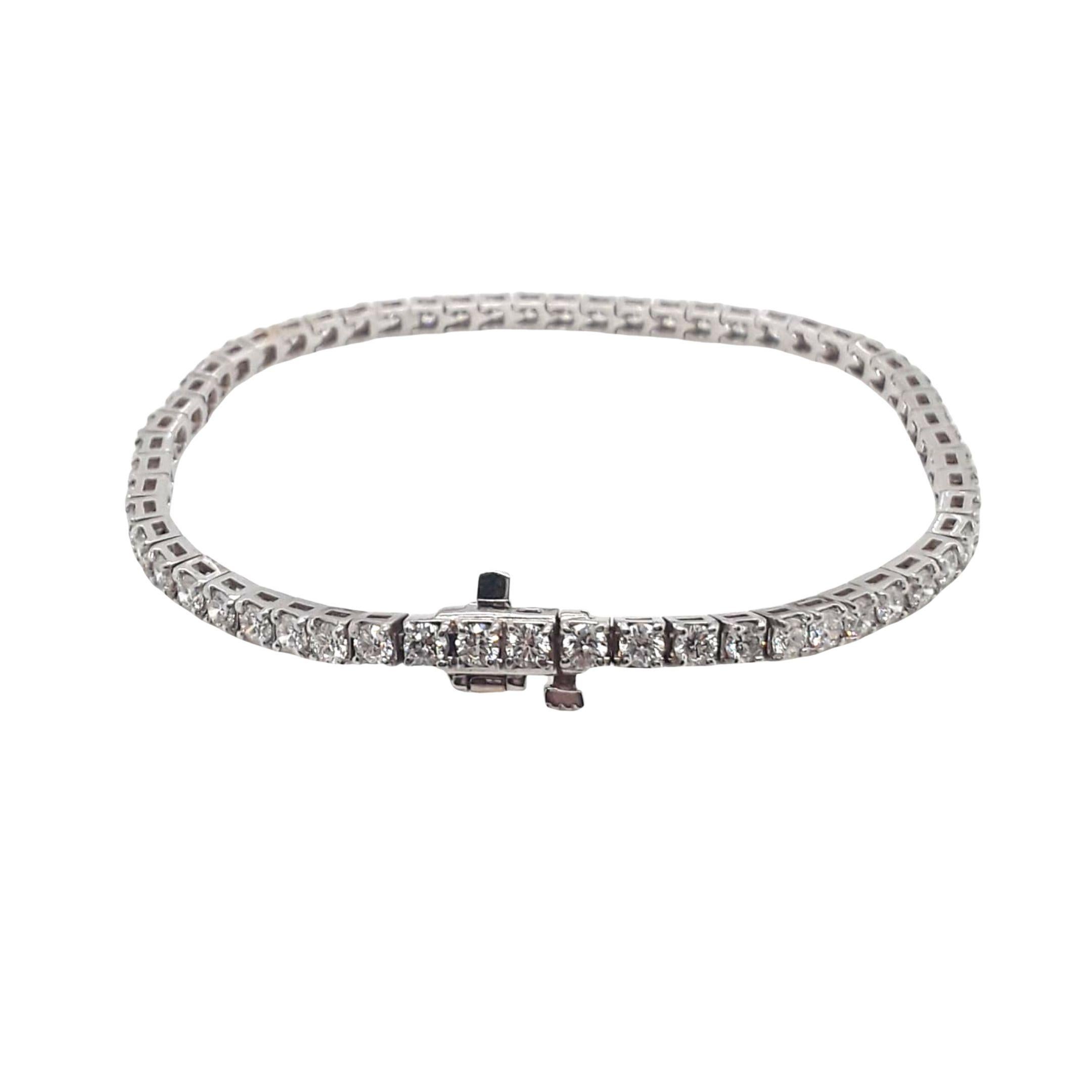 Diamond tennis/line bracelet made with real/natural brilliant cut diamonds. Diamond Weight: 4.11 carats, Diamond Quantity: 58 (round diamonds), Color: G-H, Clarity: VS1-VS2. Mounted on 18 karat white gold.