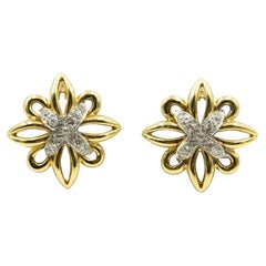 Orecchini a fiore in oro giallo con diamante grande