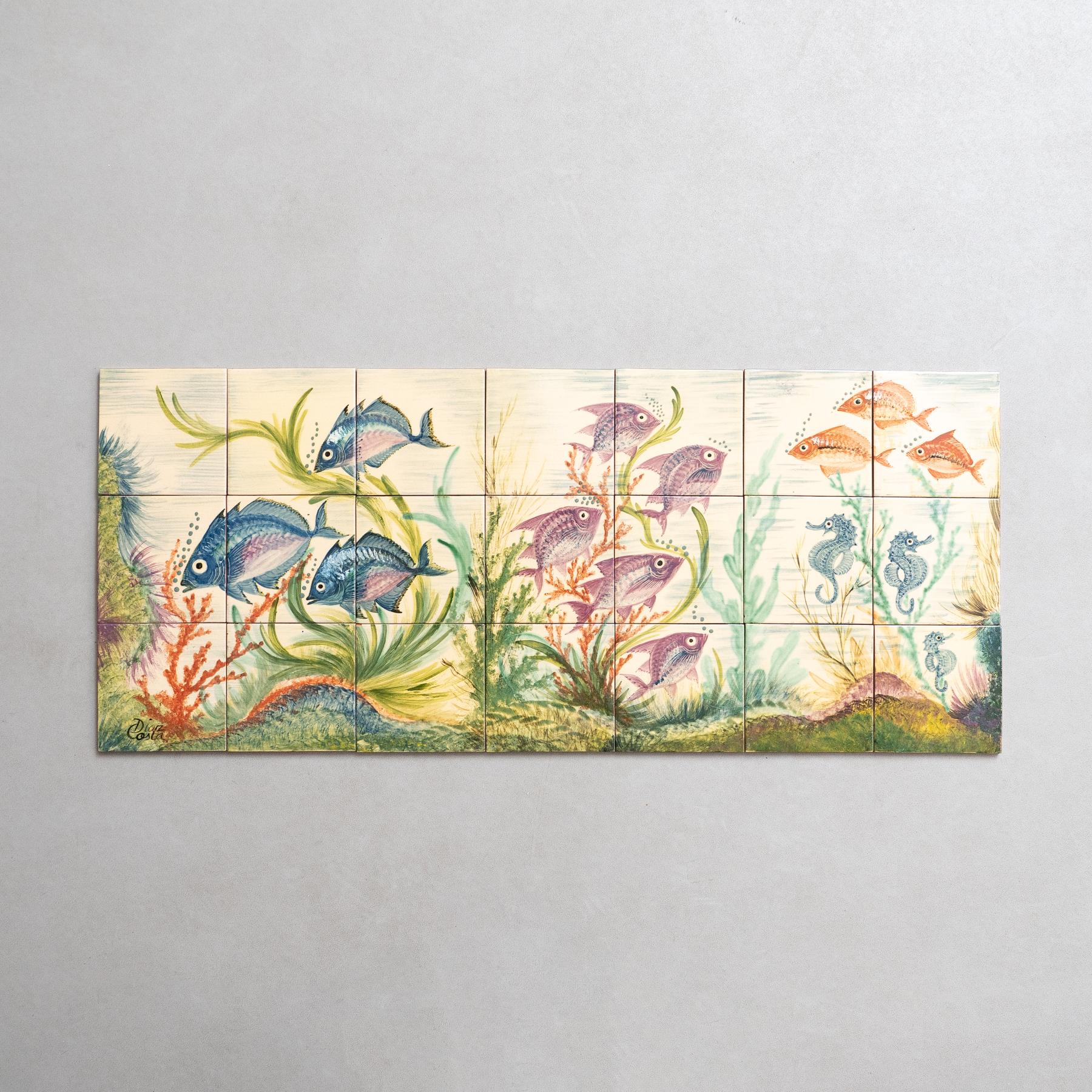 Dive into the mesmerizing world of Catalan artist Diaz Costa with this captivating ceramic hand-painted large artwork featuring a school of fishes, a masterpiece from around 1960. Adorned with the artist's signature, this exquisite piece is a