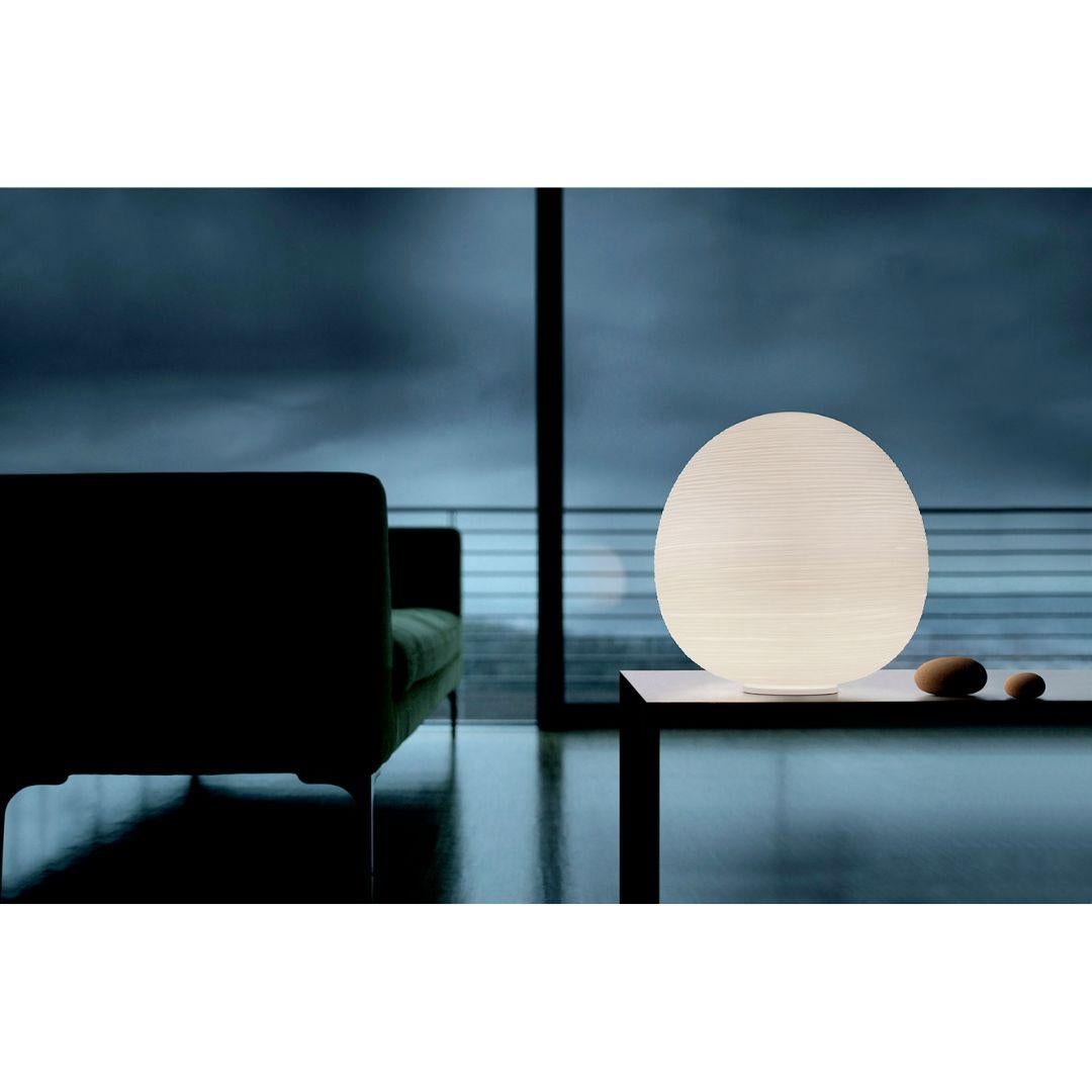 Large ‘Rituals XL’ handblown opaline glass table lamp in white for Foscarini

Designed by Ludovica + Roberto Palomba and produced by Foscarini, the Italian lighting firm founded in Venice on the legendary island of Murano, where generations of