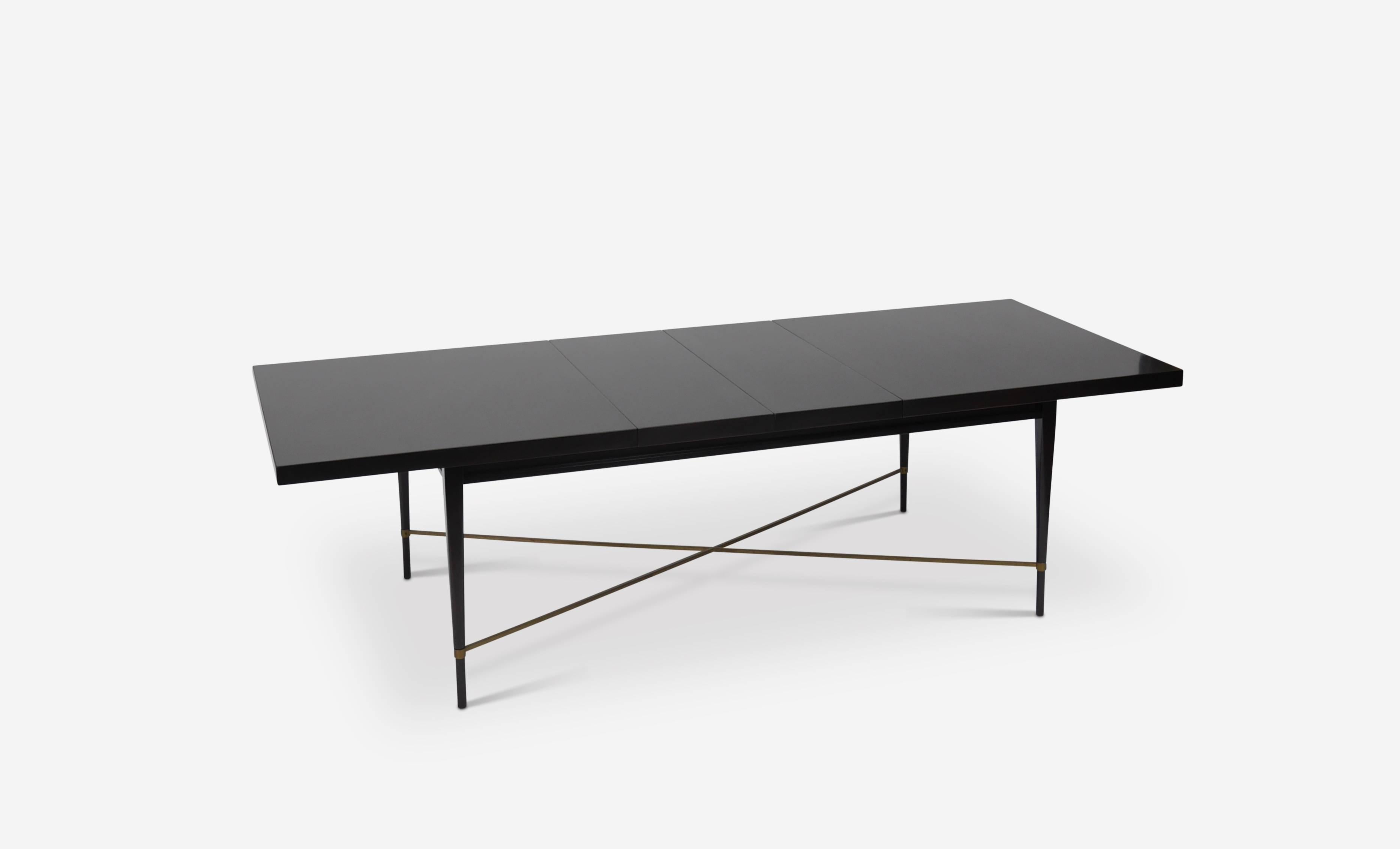 Large and elegant dining table by Paul McCobb for Directional / Irwin Collection

Model # 8909. The largest and most substantial dining table McCobb offered through Directional. The design features a brass stretcher, a stationary base and a top