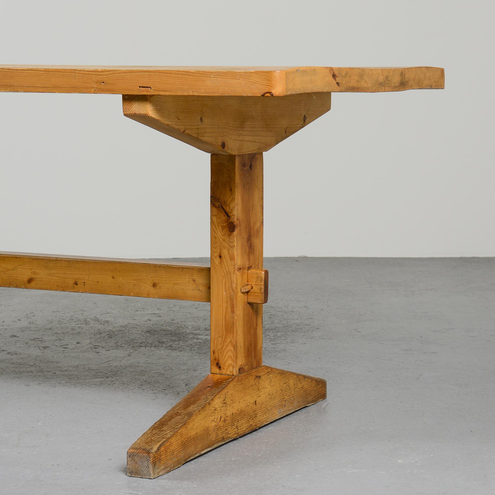 Large dining room table by Christian Durupt that will be perfect to welcome many guests.

It is made of solid pine wood and has a rectangular table top.

Origin: Méribel ski resort, French Alps, circa 1970.