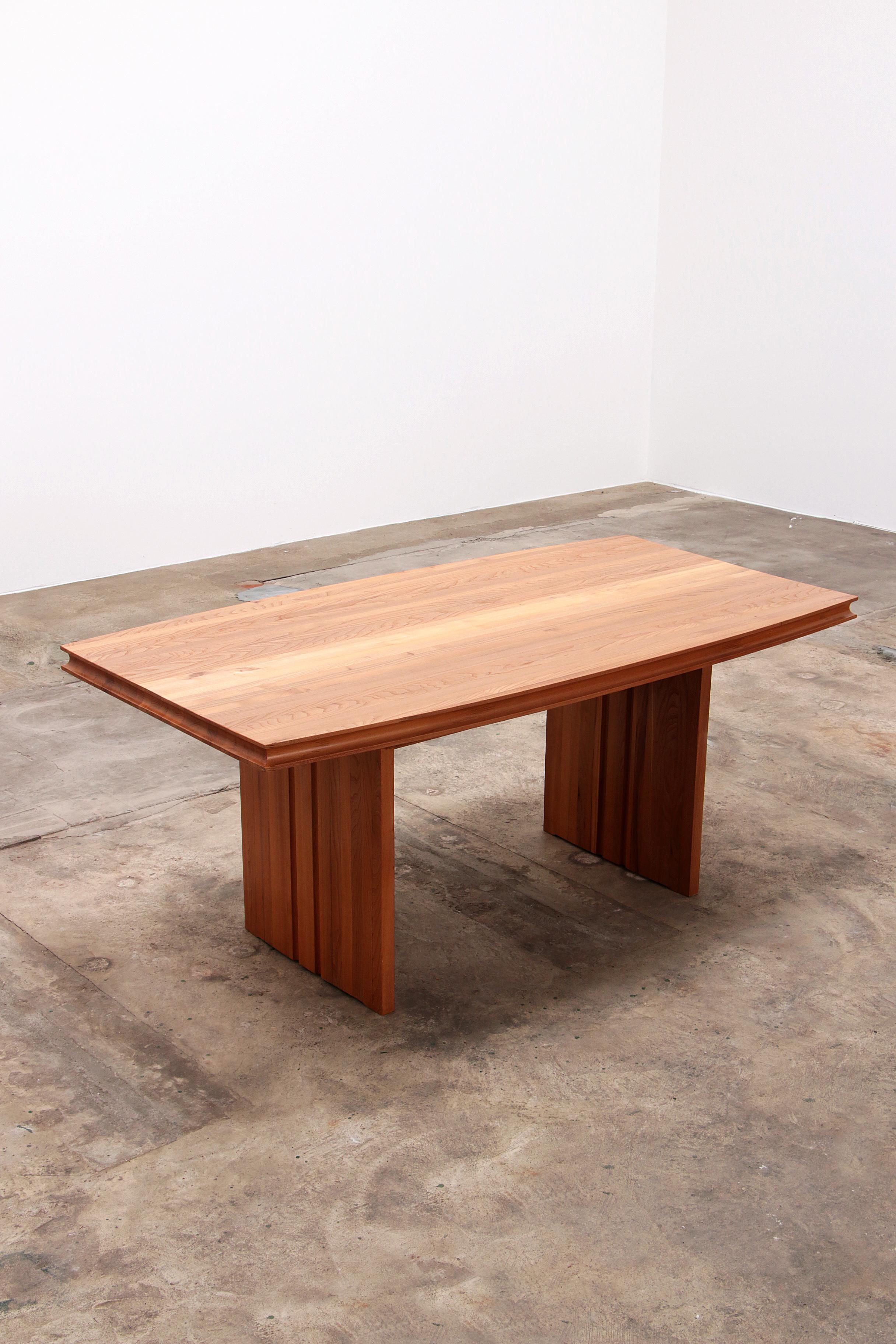Large table made of light wood in perfect condition. The table has 2 heavy wooden legs. The table is in 1 piece and the top is fixed. This table could also serve very well in the office for the meeting.

The style of the table is very similar to the