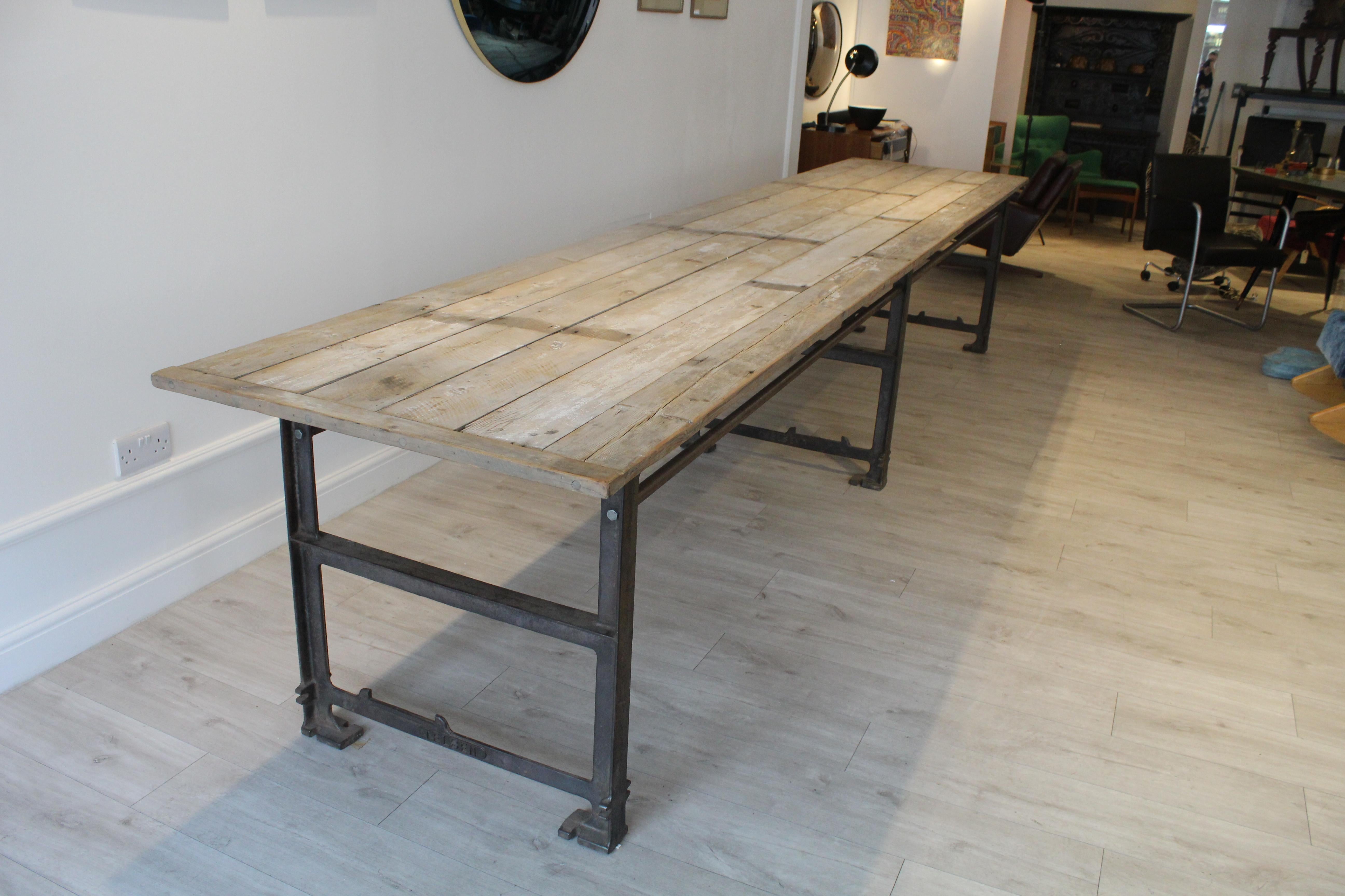 This is a rare, one off handmade extra long dining table.

The table top has been made from reclaimed wood with a rustic and scrub top finish. The base is made from reclaimed steel which gives an industrial and stylish style to the table.