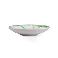 Large dish decorated with serpentine flowers and glazed in white and light green