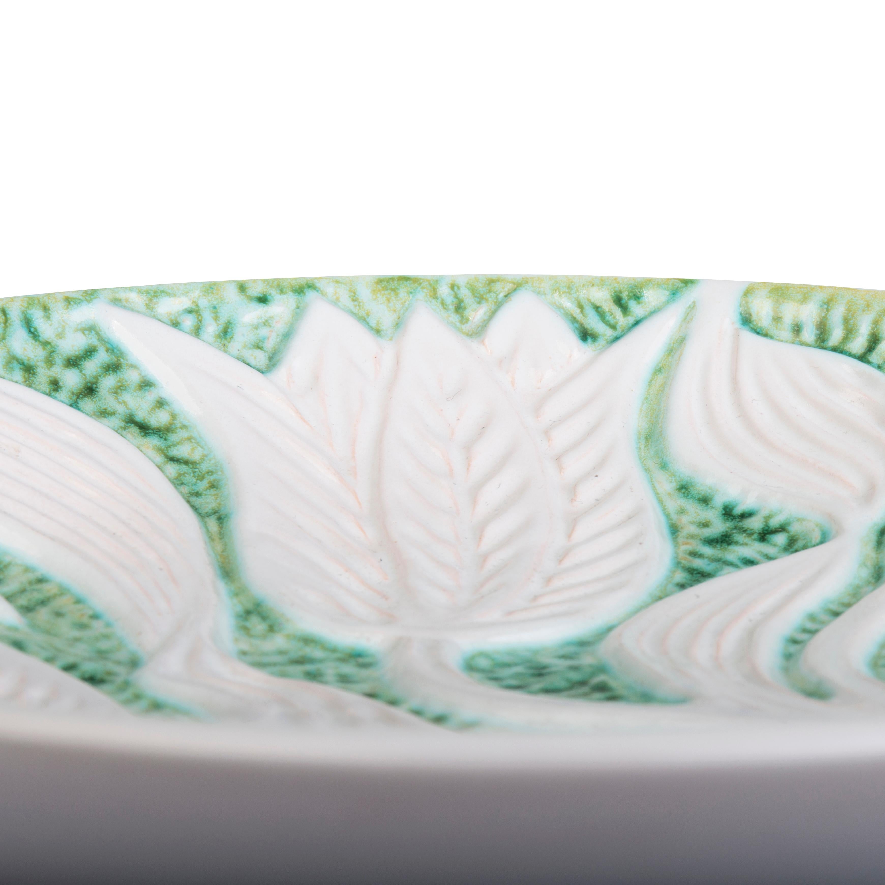 Danish Large dish decorated with serpentine flowers and glazed in white and light green For Sale