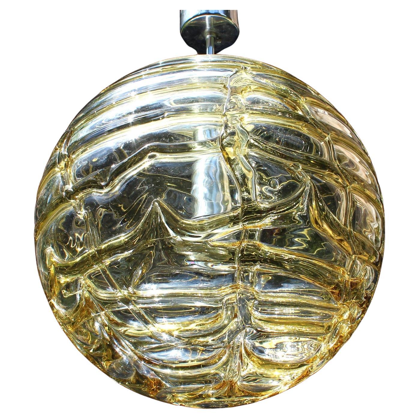 Heavy Doria Fürth crystal glass globe pendant light Germany 1970s

1 light E27

Measures: Diameter 14 inches height of the body 13 original height 29 inches weight 13 LBS

Fantastic large Biomorphic 1 light (e27) hand-blown glass globe pendant
