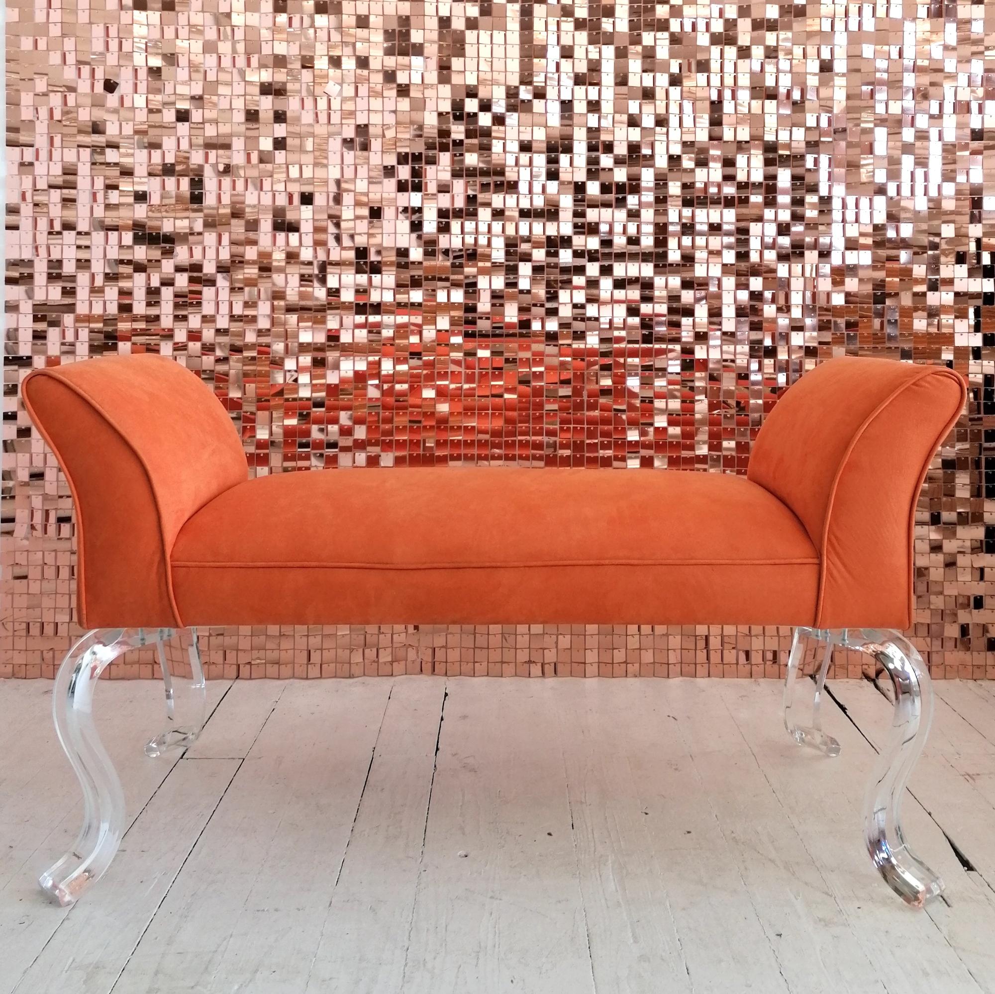 Large vintage double-ended bench by Shlomi Haziza, USA c1980s. 
Curvy lucite legs, light orange ultrasuede upholstery, in excellent condition.
Labelled on leg.
Legs can be easily removed for transport.

Dimensions: width 130cm, depth 59cm, height