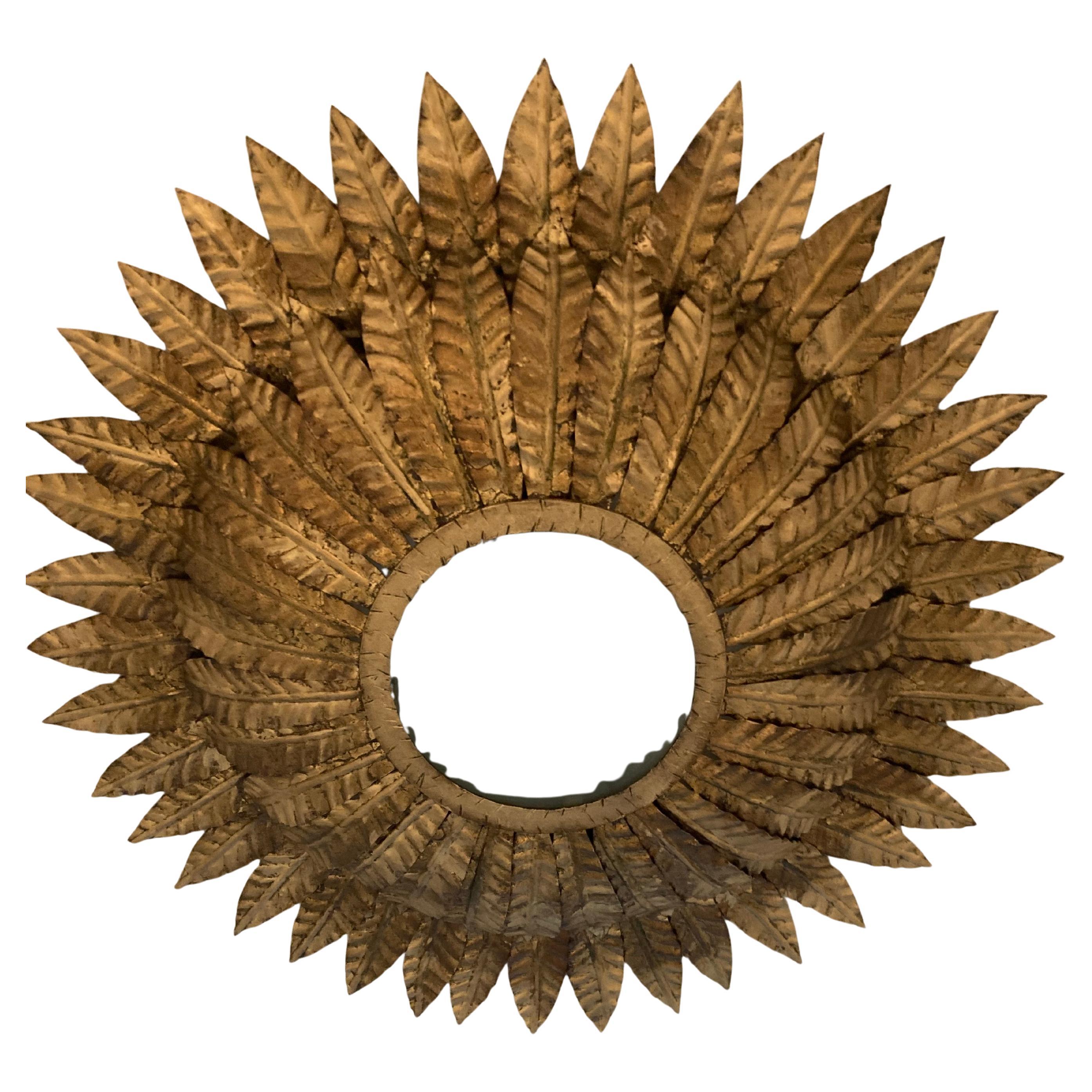 Spanish Sunburst Eyelash  Flush Mount Light In Gilt Iron For Sale