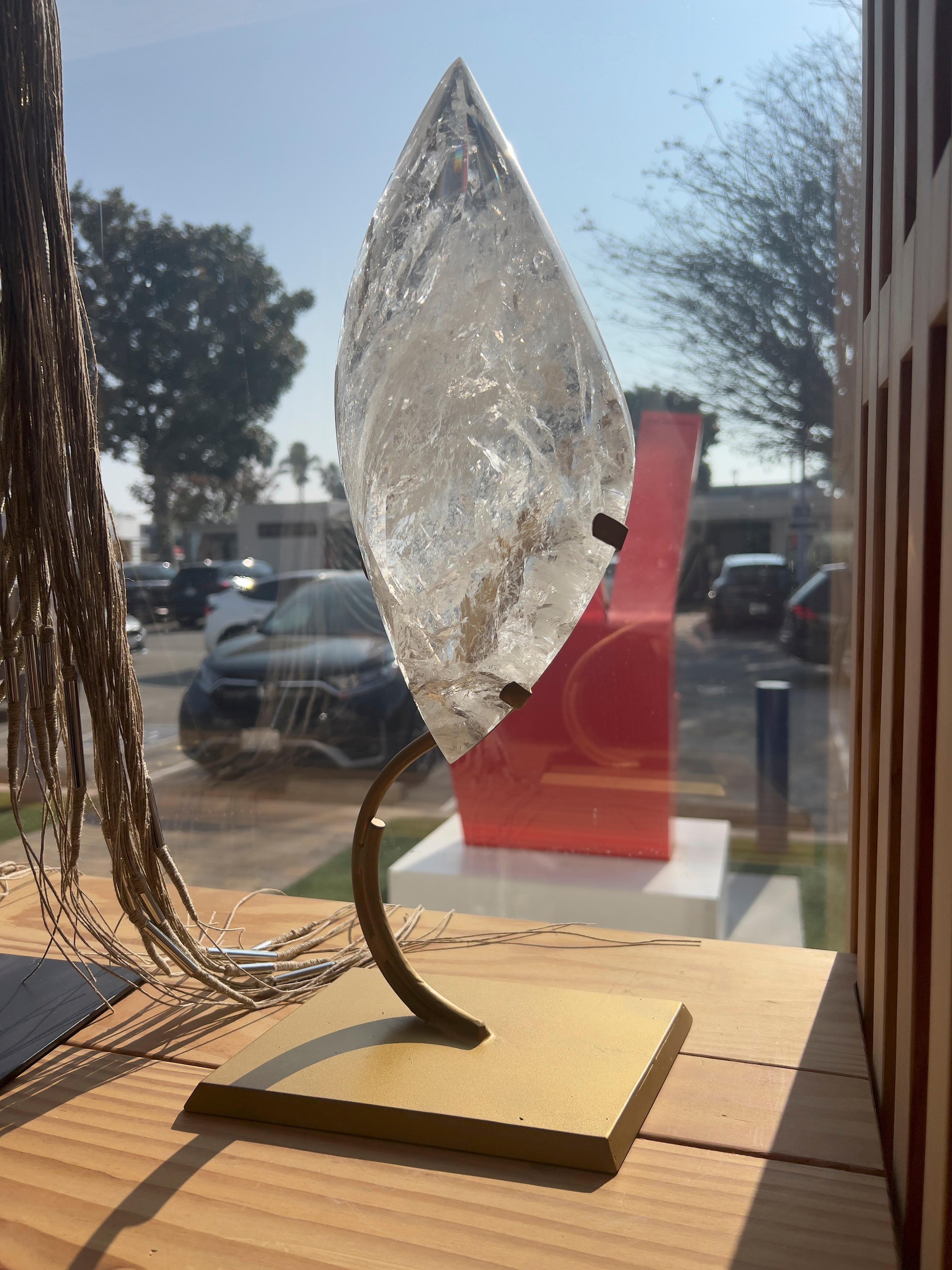 Large Clear Quartz Crystal Flame Sculpture, Natural Clear Quartz Generator. With gorgeous aesthetics and expert carving, this is an exquisite quartz flame sculpture. Its unique shape, combined with the natural inclusions and brilliant reflections,