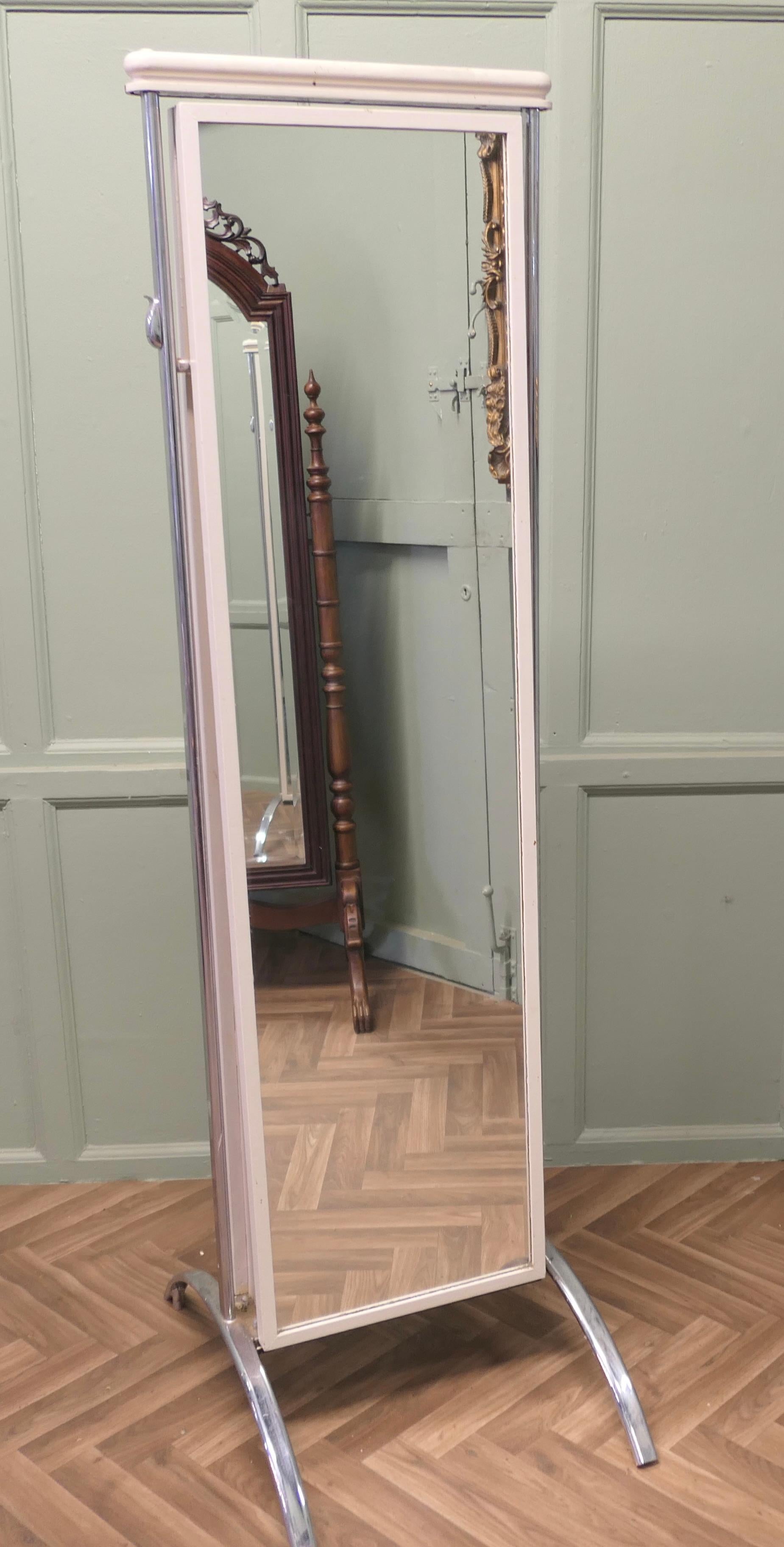 Large Double Sided Full Length Dressing Mirror

This is a very heavy sturdy double sided mirror, the chrome and white frame sits on heavy arched chrome feet, both of the mirrors slope outward at the bottom giving a good view to the user, there is