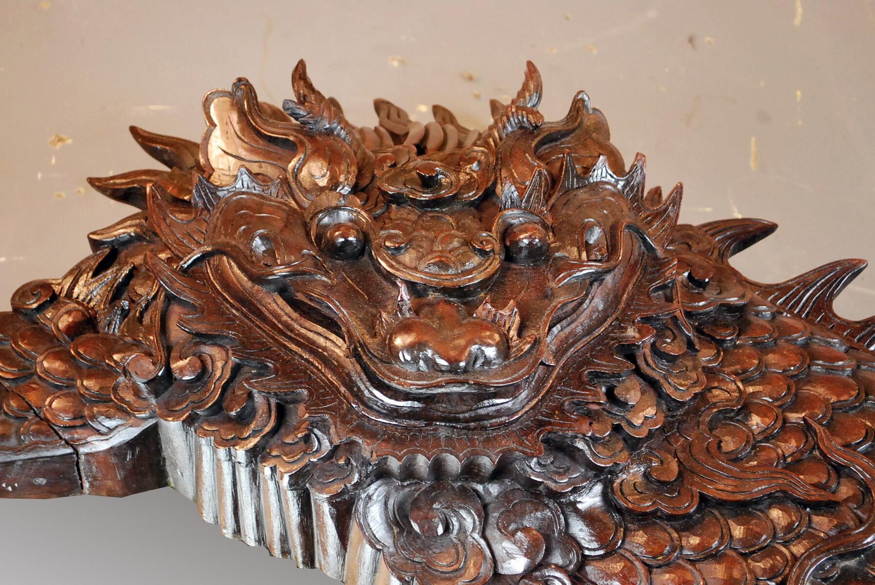 Large dragon mirror in finely carved iron wood, 19th.
