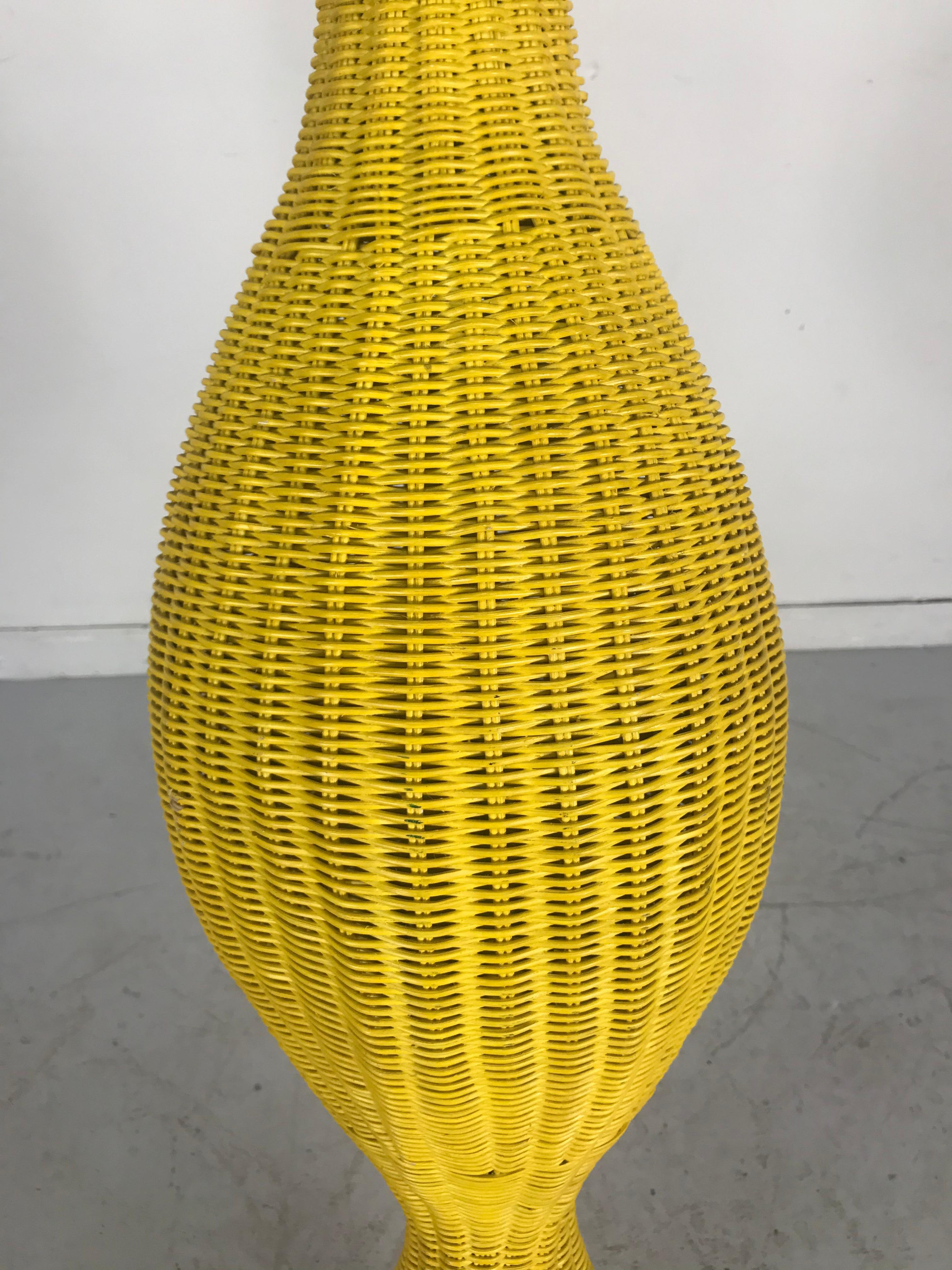 Monumental wicker surrealism Totom sculpture, Italy, circa 1960s. Quality, sturdy construction, wicker shaped around steel interior. Amazing design, very dramatic, Would make a statement in any environment. Retains original banana yellow paint, hand