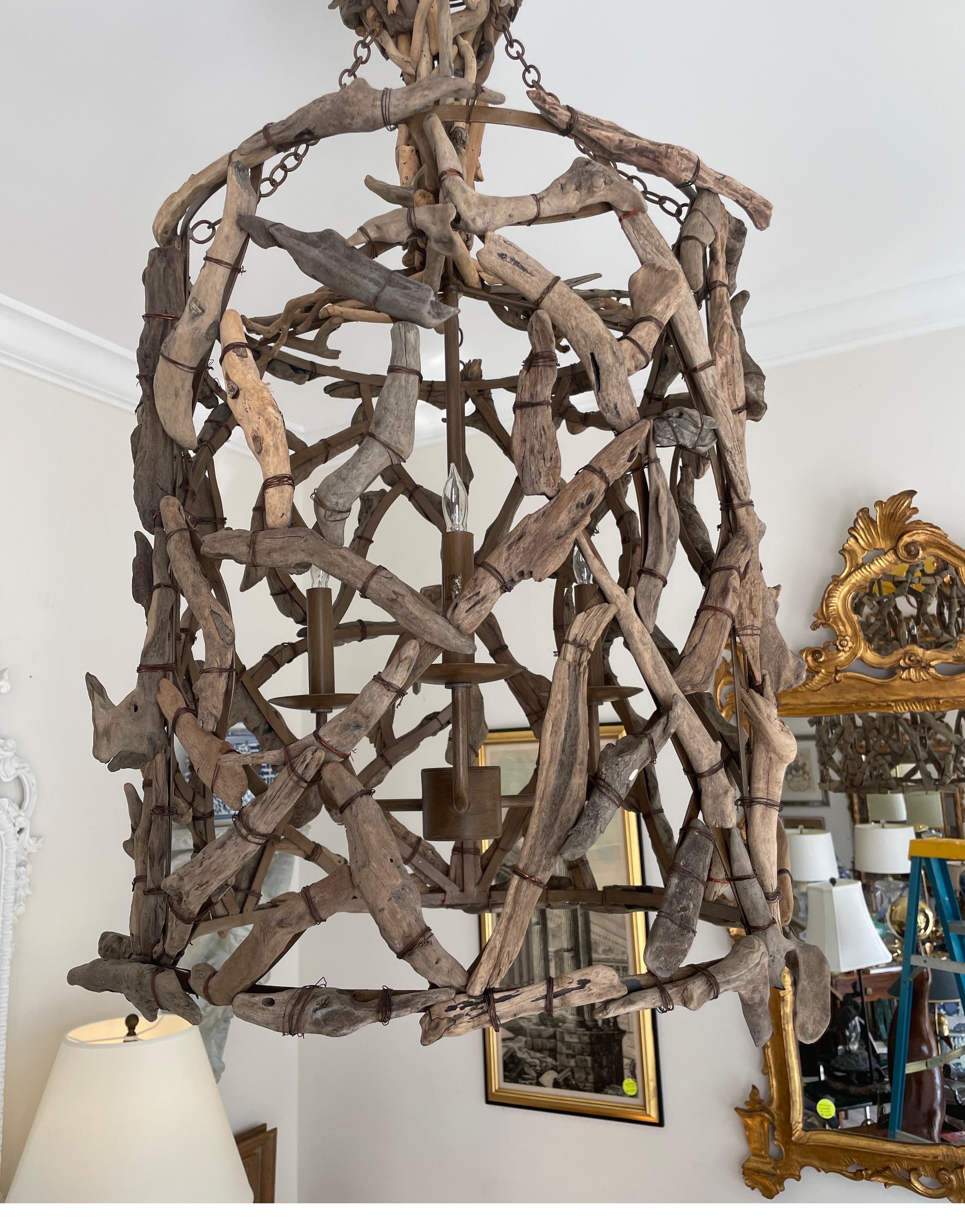 Wonderful handmade driftwood lantern. Each piece of natural driftwood is wired on to a metal frame to form a unique piece.