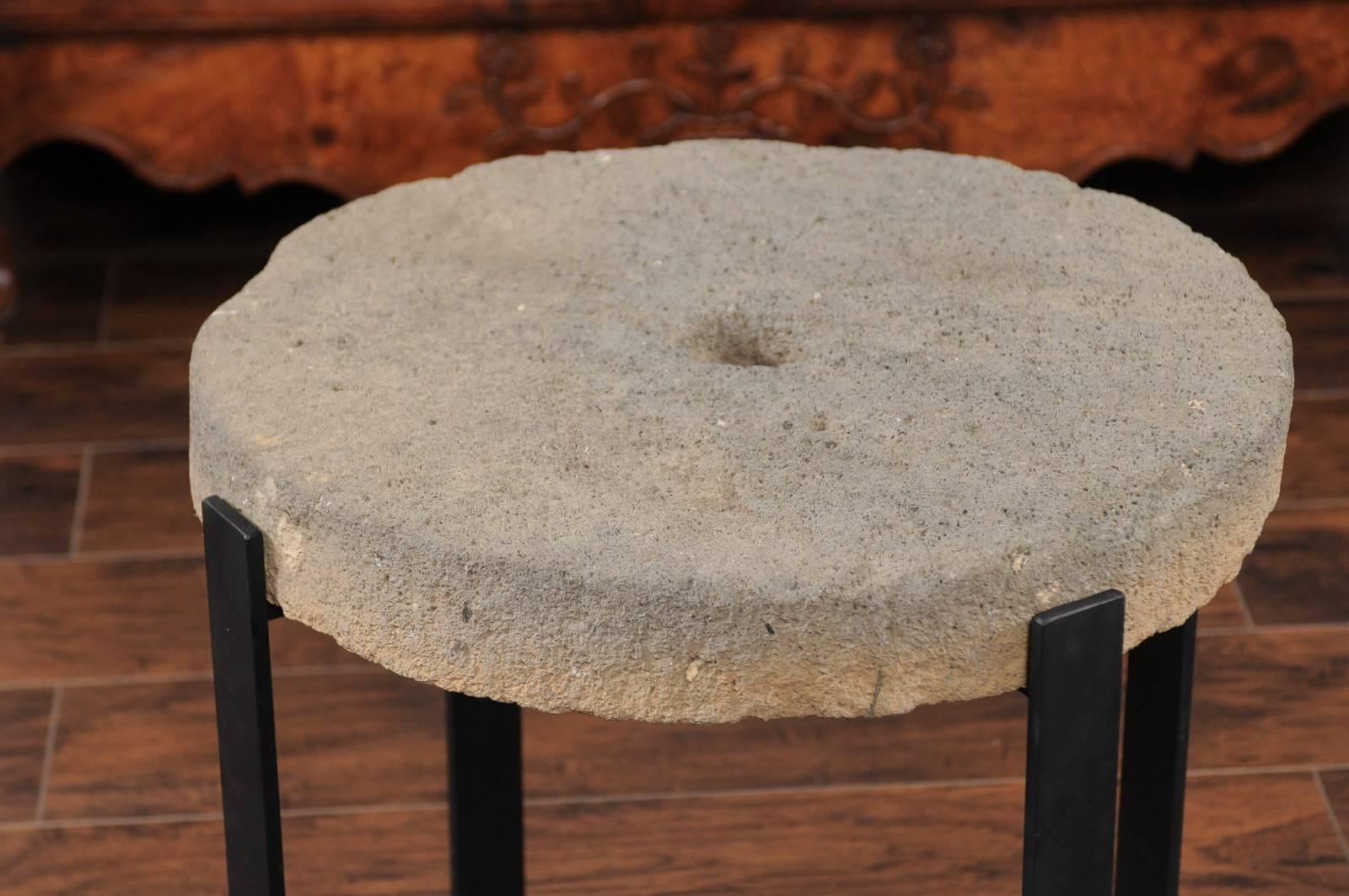 Large Drink Table Made of 1920s Millstone Top Mounted on a New Black Iron Base In Good Condition In Atlanta, GA