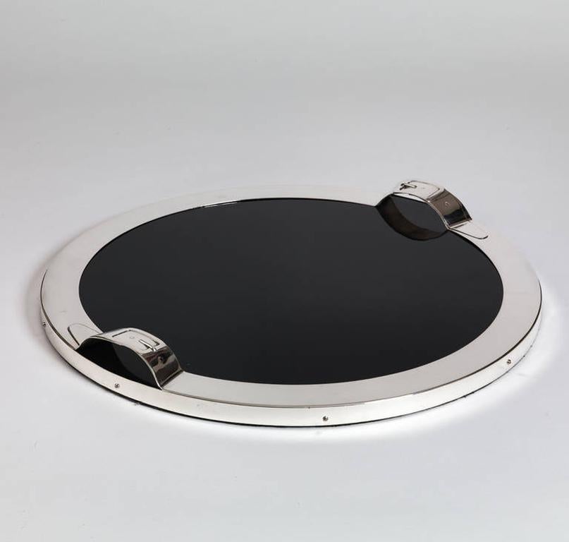 A great looking large drinks tray with a glossy black lacquered finish & sleek silvered surround with strap & buckle decorated handles. 

A great postmodern look & ideal for a bar or coffee table. 

English, circa 1965-1970 

We are always