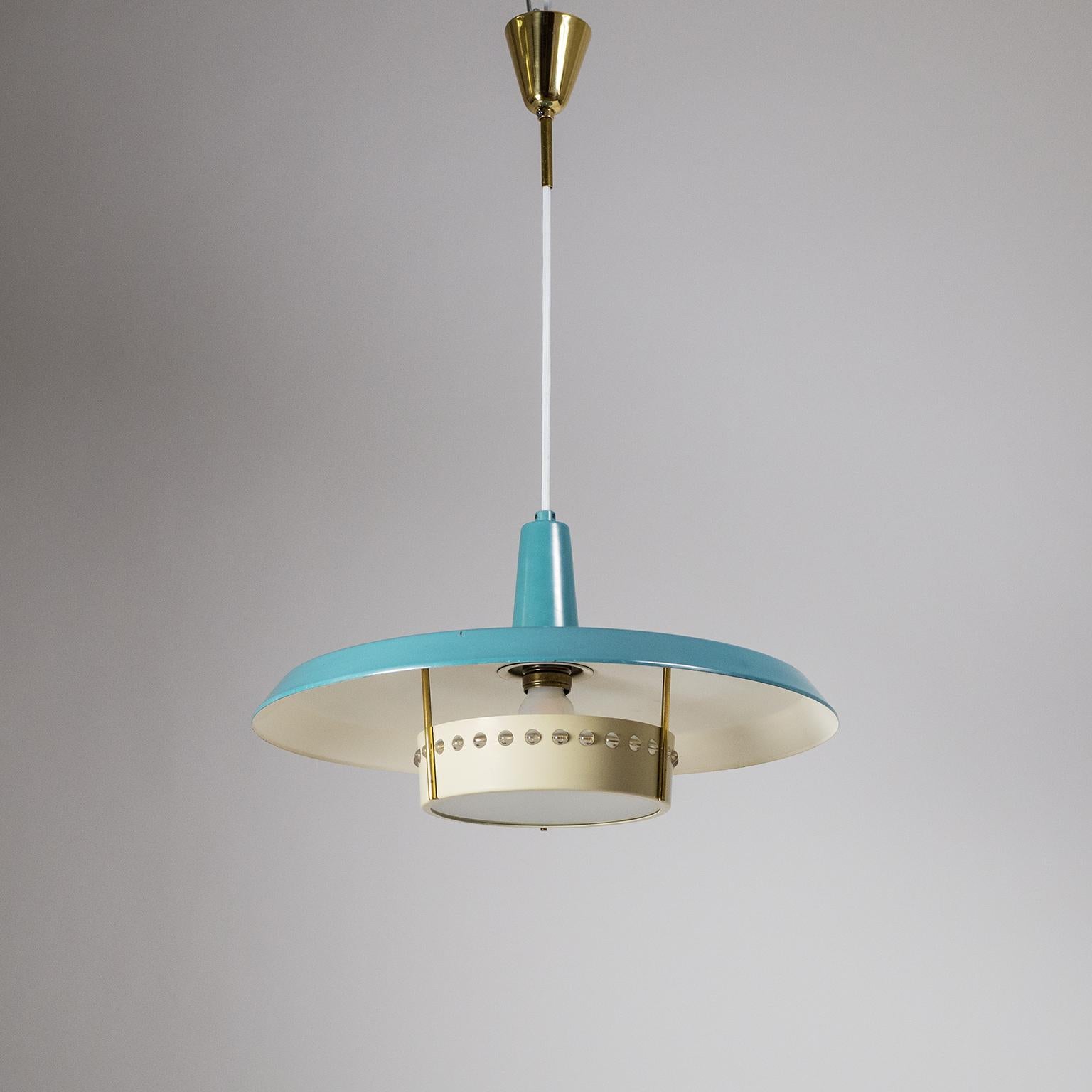 Very unique mid century pendant attributed to J.T. Kalmar from the 1950s. Large pastel petrol-colored shade to which a smaller diffuser is attached with three brass stems. The diffuser has a satinated glass disc placed in an off-white lacquered rim