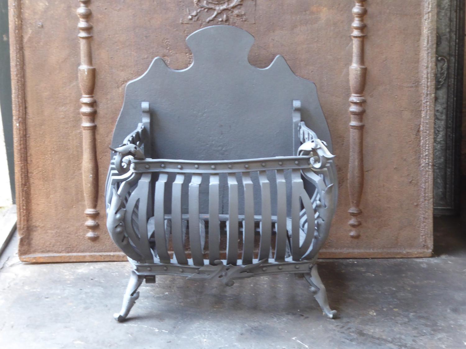 Beautifully forged Dutch Art Nouveau fireplace basket or fire basket. The fireplace grate is made of wrought iron and cast iron.

This product has to be shipped as freight due to its size and/or (volumetric) weight. You can contact us to find out