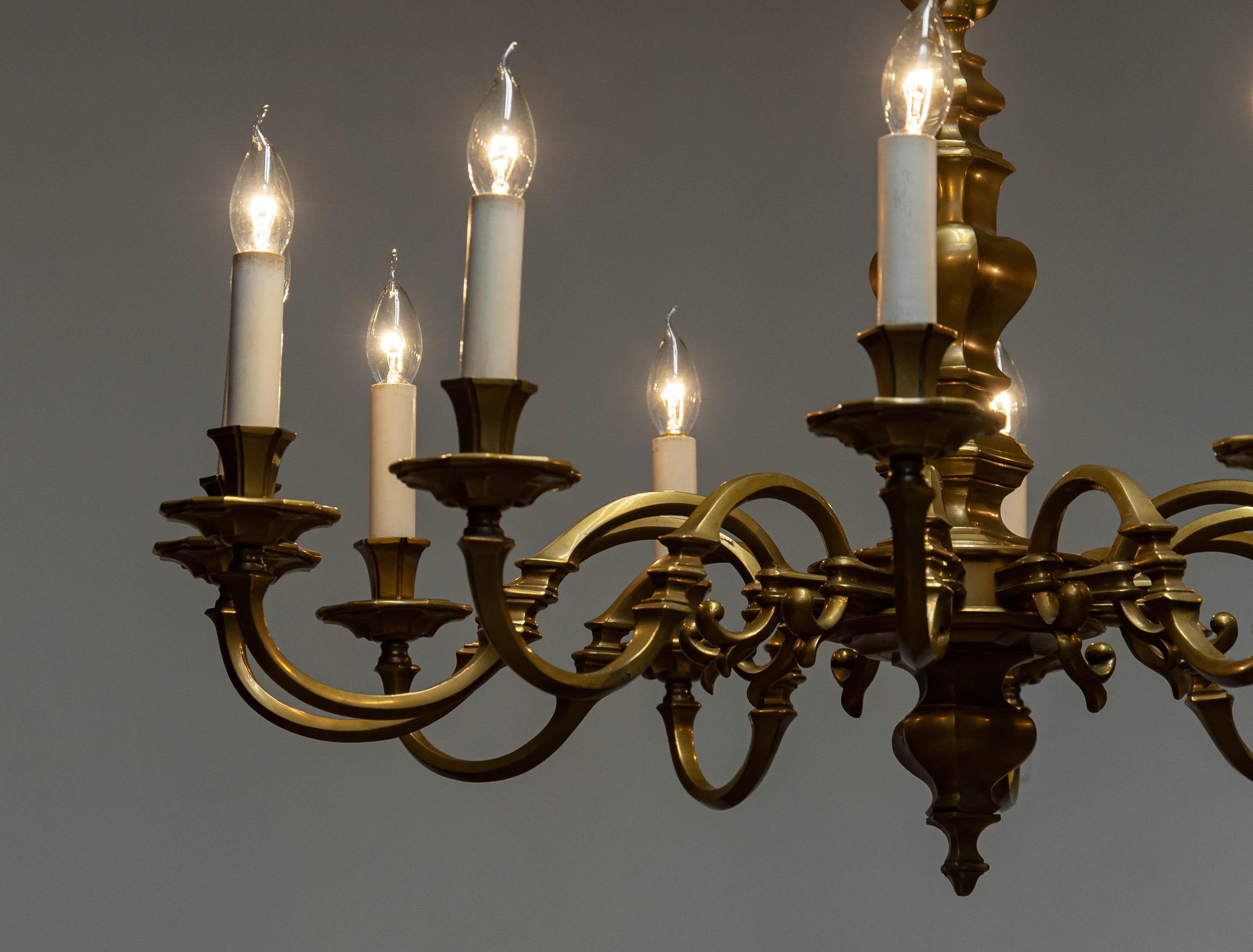20th Century Large Dutch Baroque / Colonial Style Brass Chandelier With 12 Arms