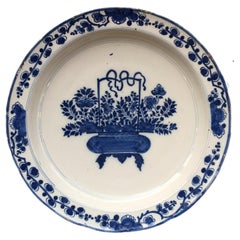Large Dutch Delft Charger with Chinoiserie Flower Basket Design, 17th Century
