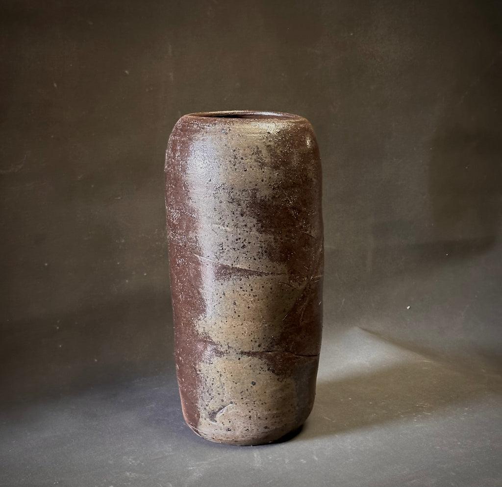 Large glazed and signed ceramic vase from midcentury Dutch pottery studio. The shape is delicate yet strong in its simplicity. An earthy, muted color palette and organic glazing pattern gives this vessel a unique wabi-sabi sensibility.