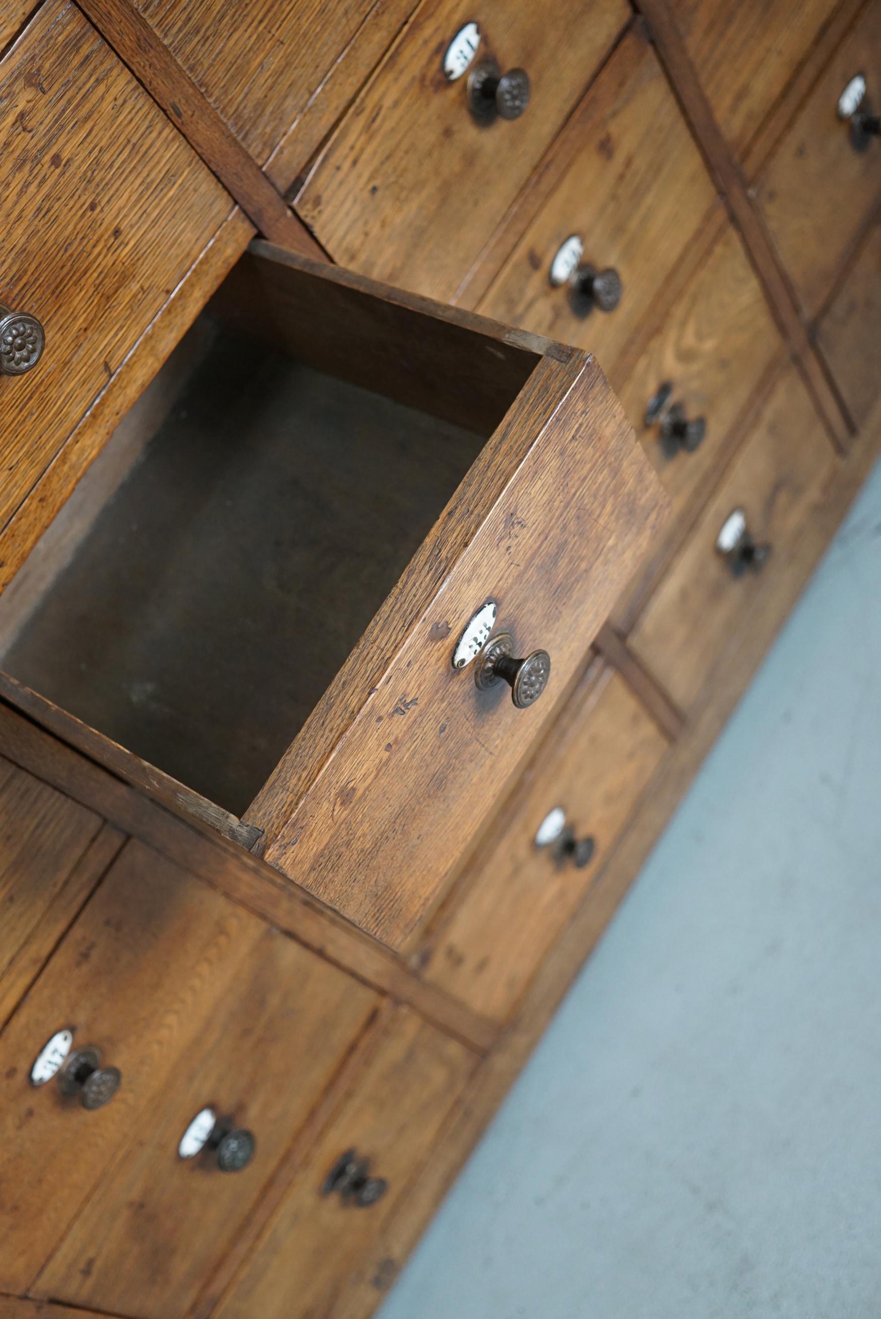 Large Dutch Oak Apothecary Cabinet / Barber Cabinet with Enamel Shields, 1900s For Sale 9