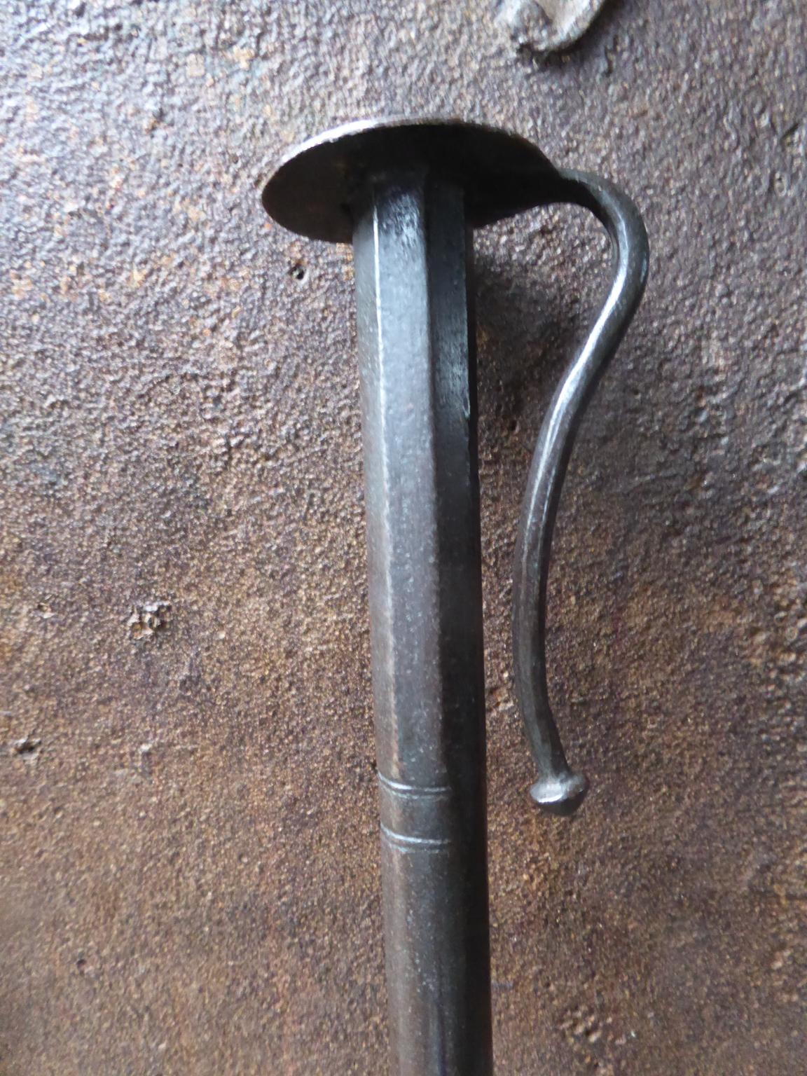 19th century, Dutch Napoleon III blow poker of a rare length, which is handy to poke and refresh the fire at a distance. The blow poke is made of wrought iron. It is in a good working condition.







          