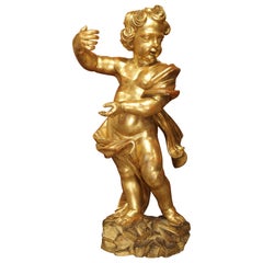 Large Early 18th Century Carved Giltwood Cherub Statue from Italy