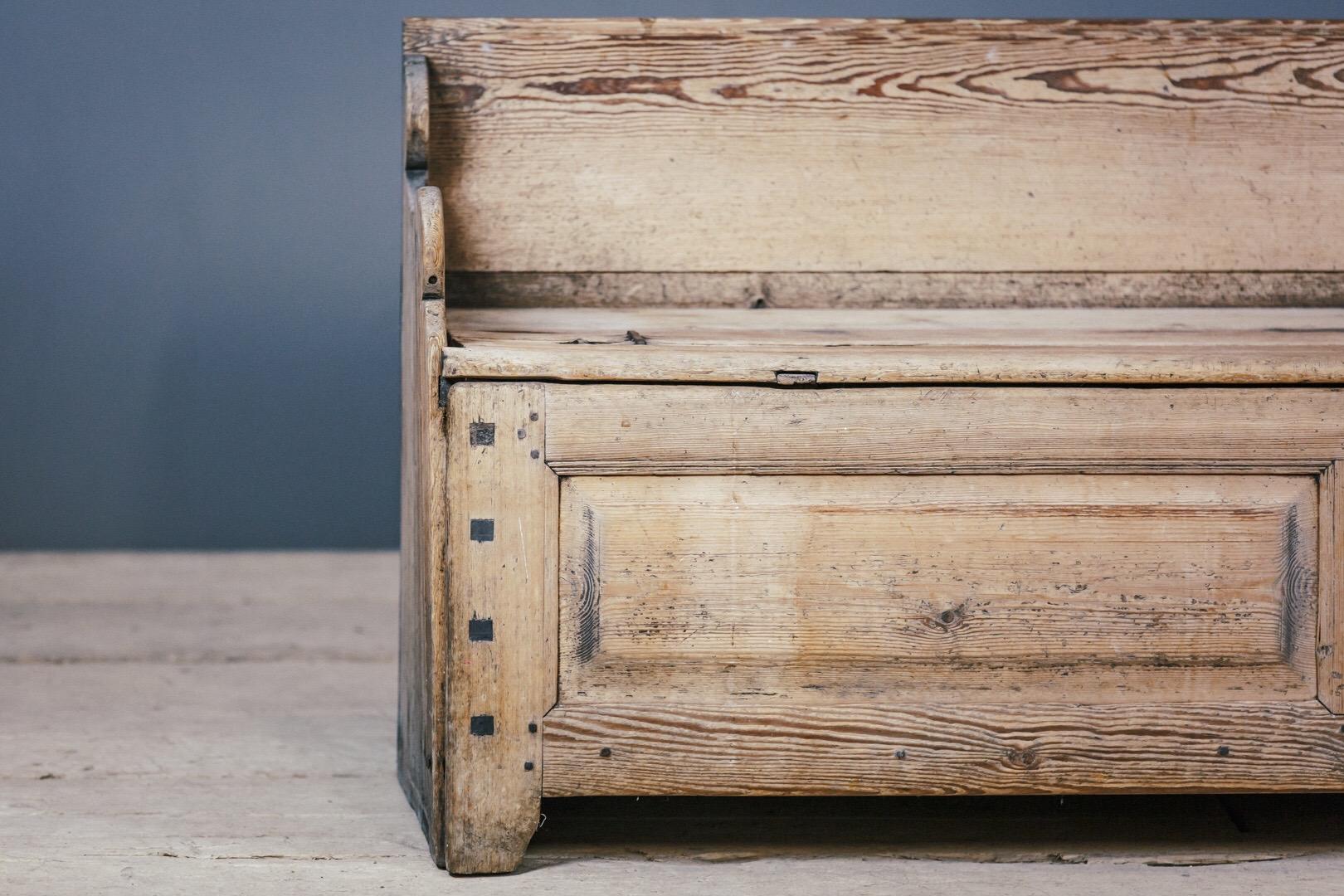 Extraordinary large Swedish box settle in pine, wonderful dry surface, this example has never been painted and weathered wonderfully. Sourced in Jamtland, Central Sweden from a forest cottage. The lid opens to provide cavernous storage, historical