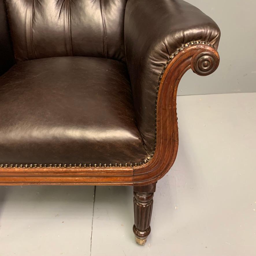 Large Early 19th Century Regency Buttoned Leather Wing Armchair on Castors For Sale 6