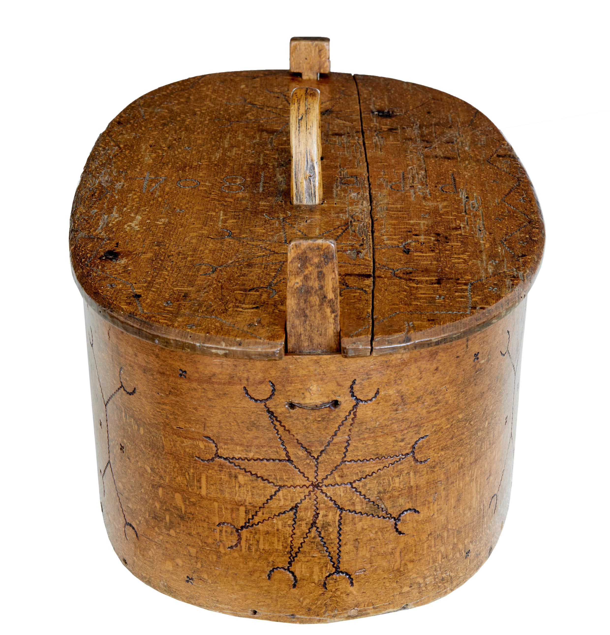 Large early 19th century Swedish tine bentwood box circa 1804.

Beautiful lidded decorative traditional tine box. Dated 1804 and initialed p.P.D. Decorated with hand carved star designs.

Original color and patina.

Age split to lid, evidence