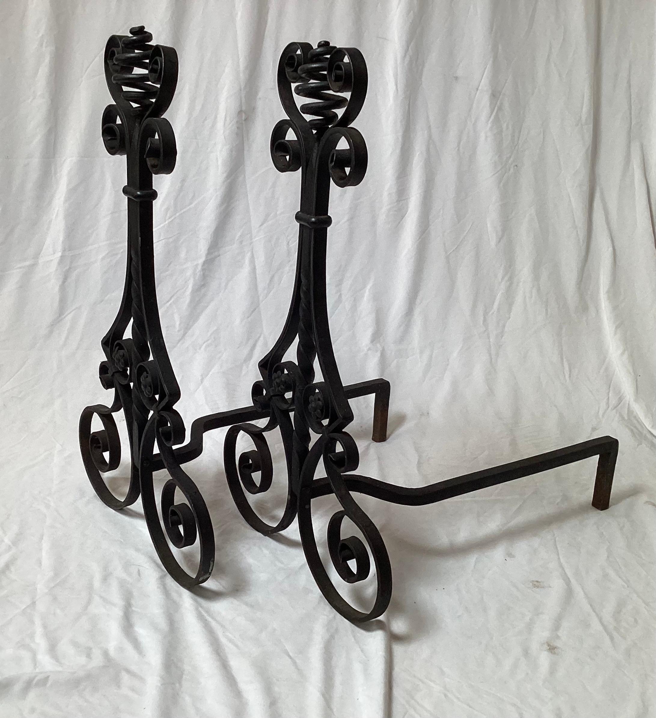Large Aesthetic Movement Hand Wrought Black Iron Andirons 28” Tall By 22” deep and 16” wide. Each andiron is one piece. Great condition with just some age-appropriate wear.