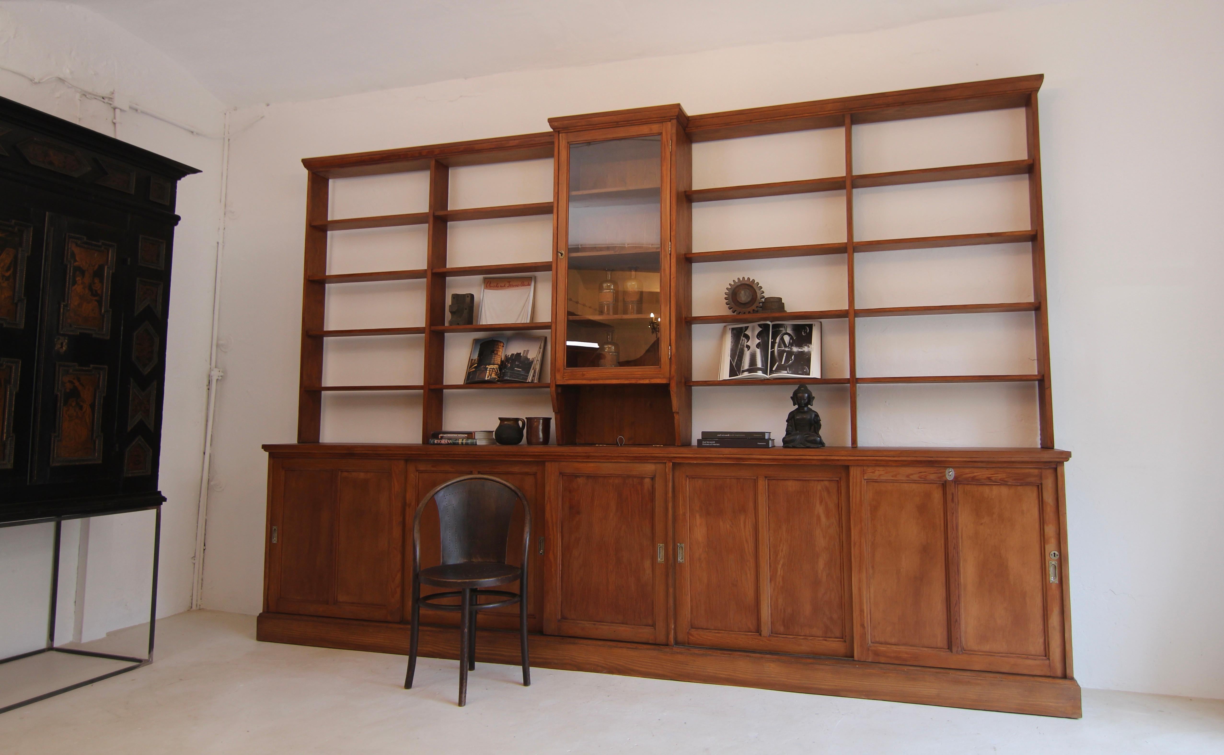 European Large Early 20th Century Apothecary Shop Cabinet or Bookcase with Sliding Doors