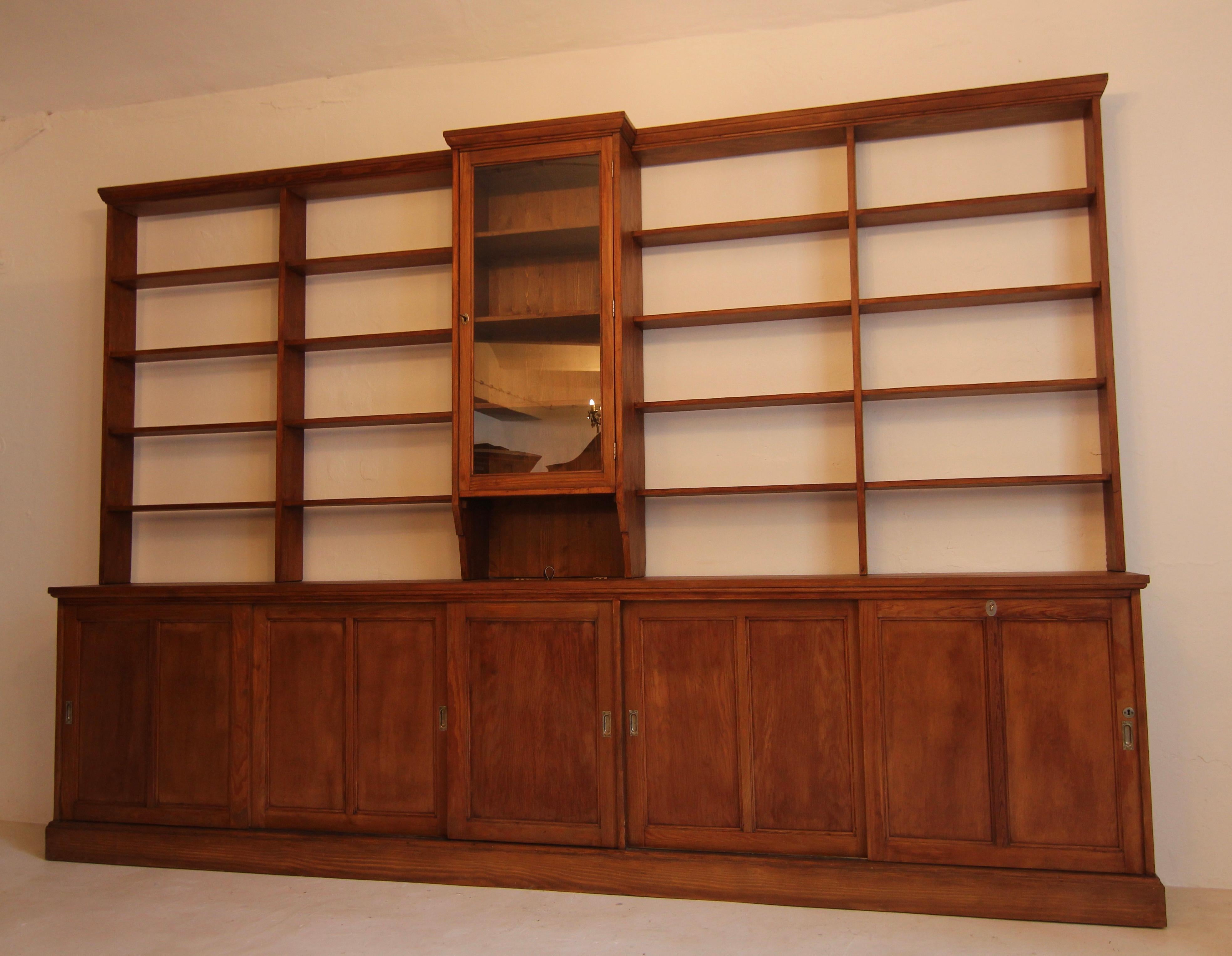 Pine Large Early 20th Century Apothecary Shop Cabinet or Bookcase with Sliding Doors