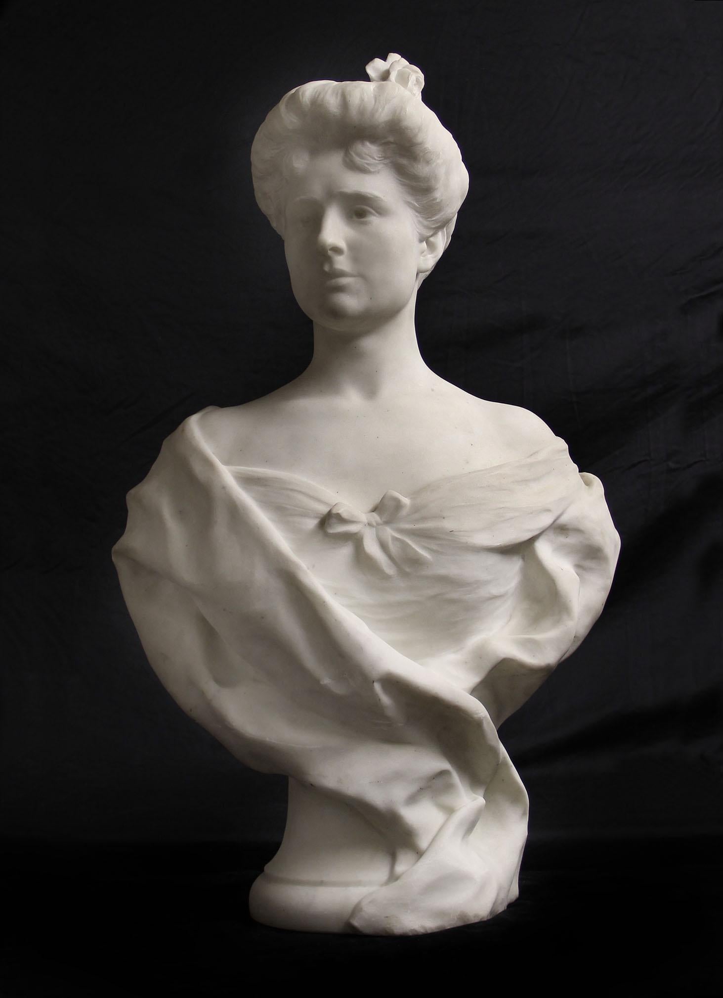An Important and Large Early 20th Century White Carrara Marble Bust of a Beauty by Auguste Maillard

The young lady depicted with draped shoulders and bow, a flower in her hair.

Signed Aug. Maillard 1905 to the back.

Auguste Maillard, born in