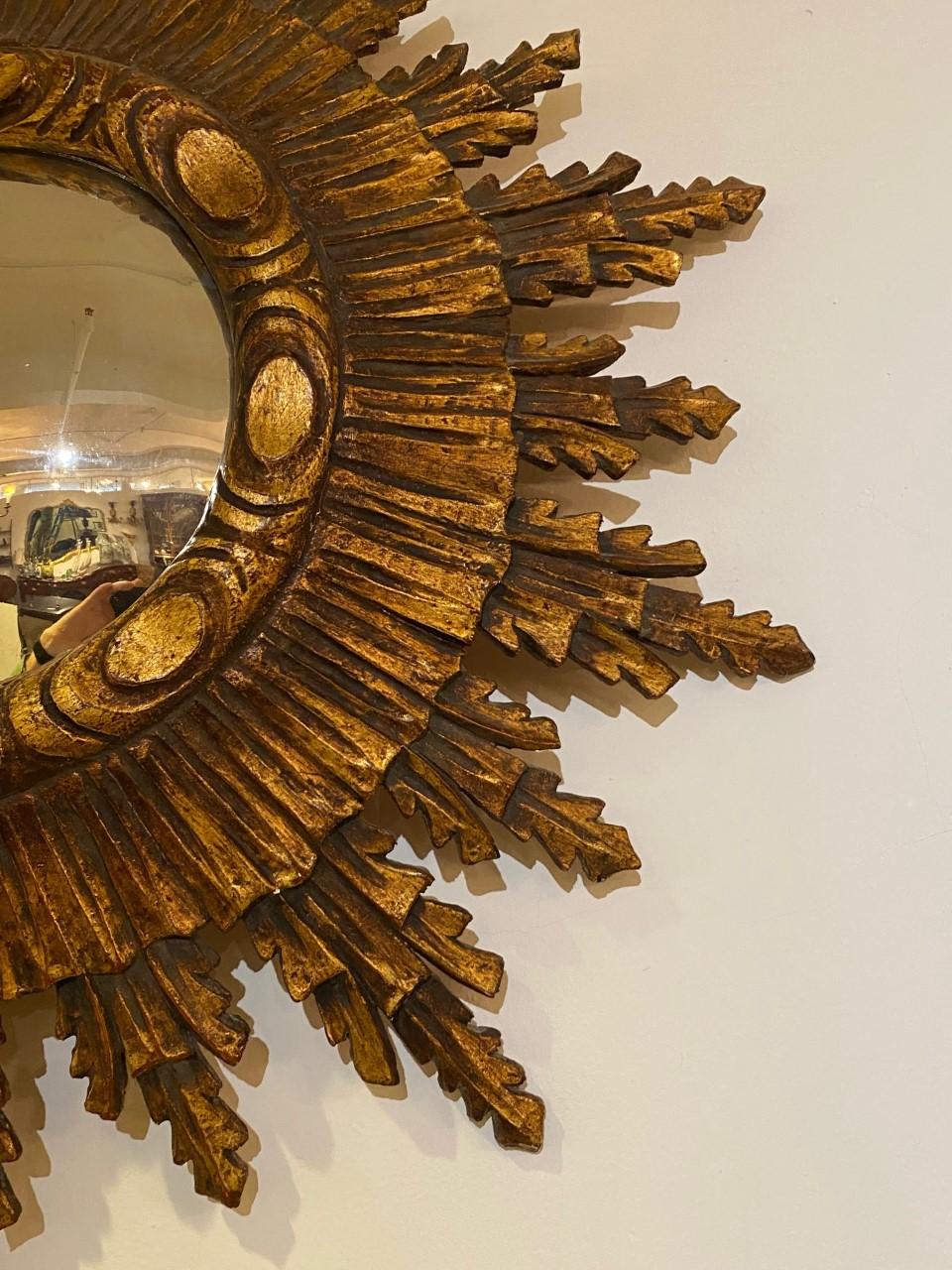 French Large Early 20th Century Carved Tiered Giltwood Sunburst Mirror from France For Sale
