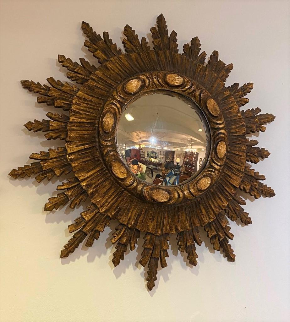 Gold Large Early 20th Century Carved Tiered Giltwood Sunburst Mirror from France For Sale