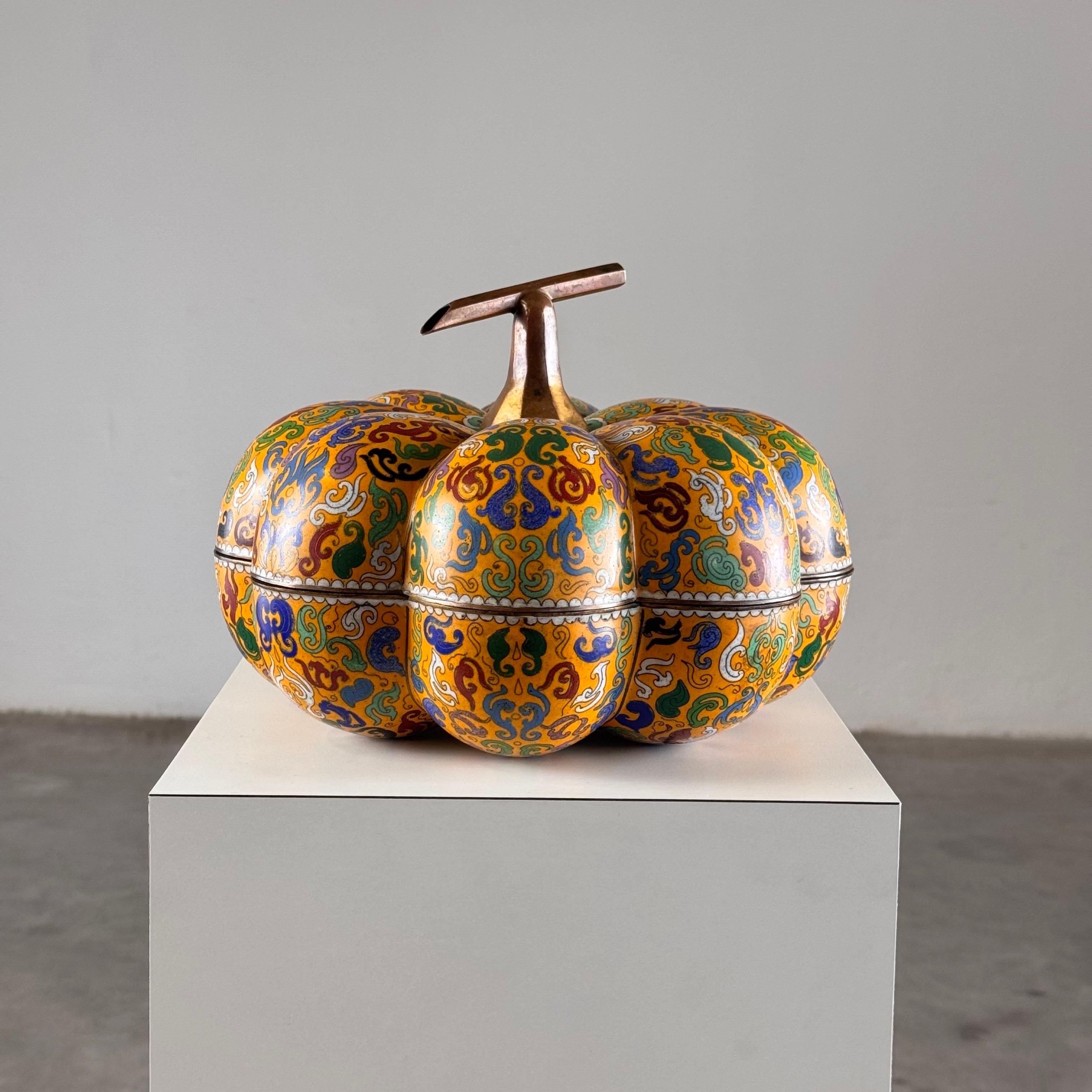 An exquisite early 20th-century Chinese cloisonné box, masterfully crafted in the 1910s, shaped like a pumpkin with a generous 30 cm diameter. This rare and highly decorative piece showcases the refined artistry of the ancient cloisonné enamel