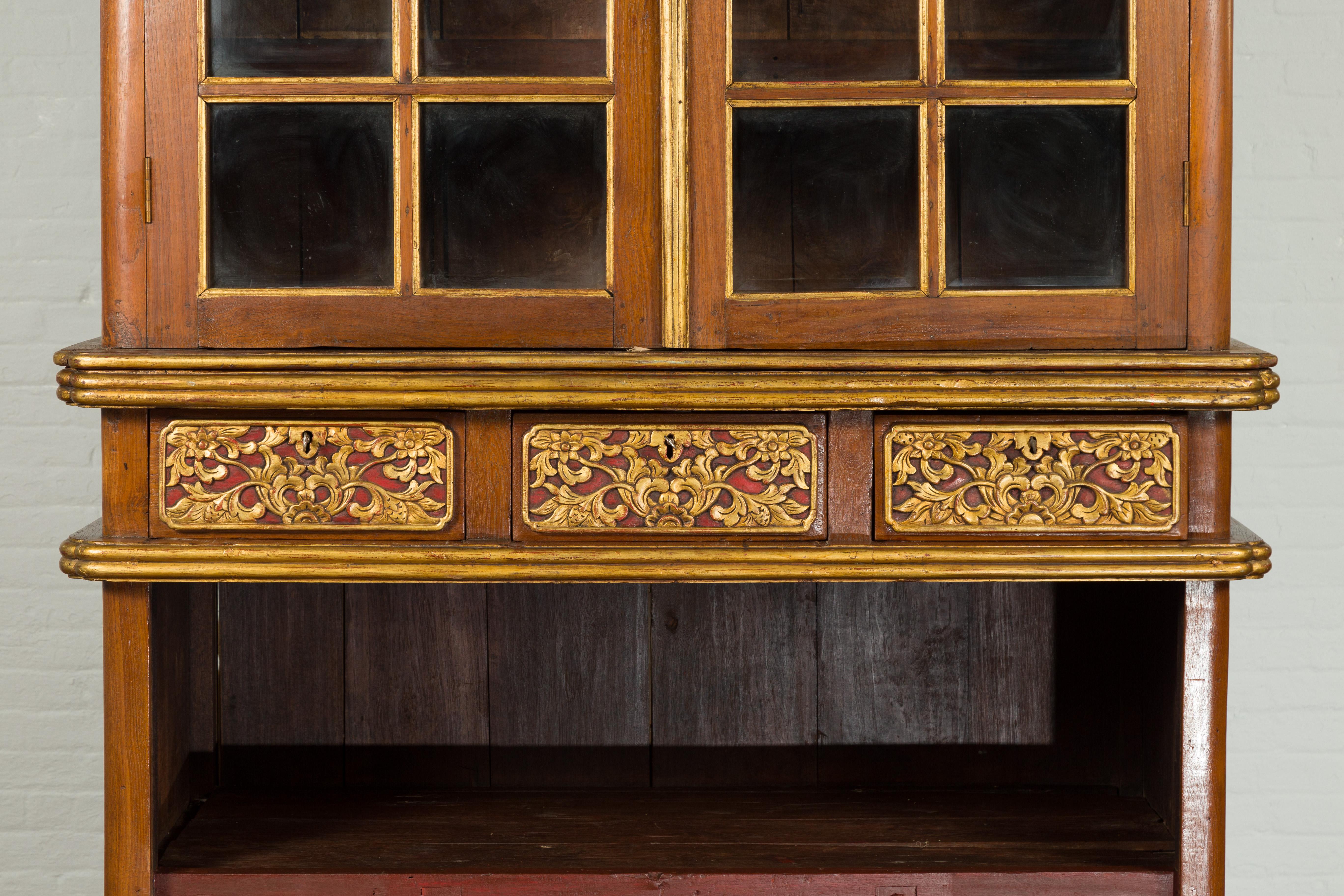 Carved Large Early 20th Century Indonesian Cabinet with Beveled Glass Doors and Drawers For Sale