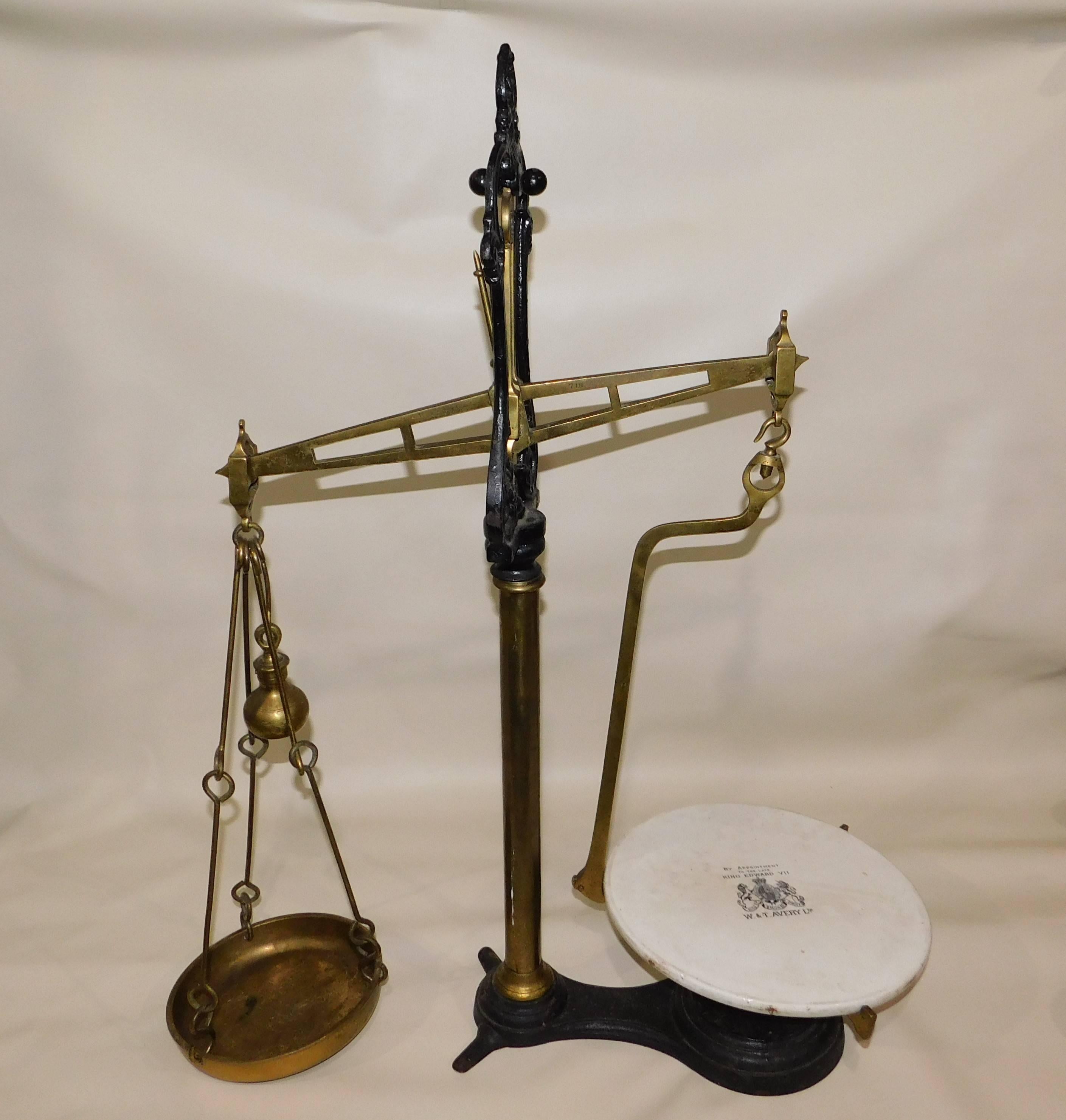 Large antique wrought iron and brass beam weight balance scale by W and T Avery Ltd. of Soho foundry Birmingham, England. Lovely black transfer on a porcelain china plate, by appointment by the late King Edward VII.