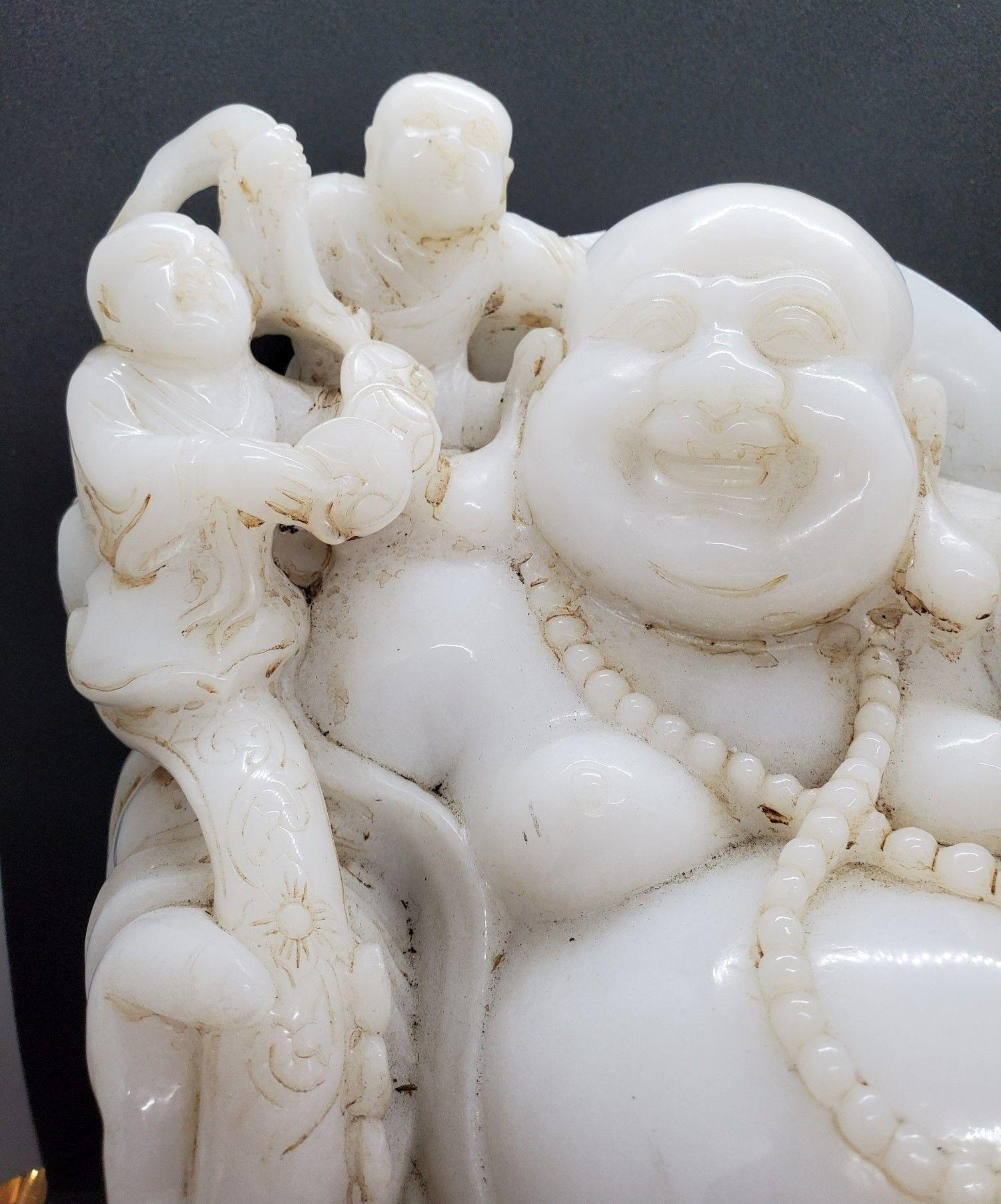 Large early 20th century Chinese marble/stone laughing buddha with children. Good weight.
Dimensions
12