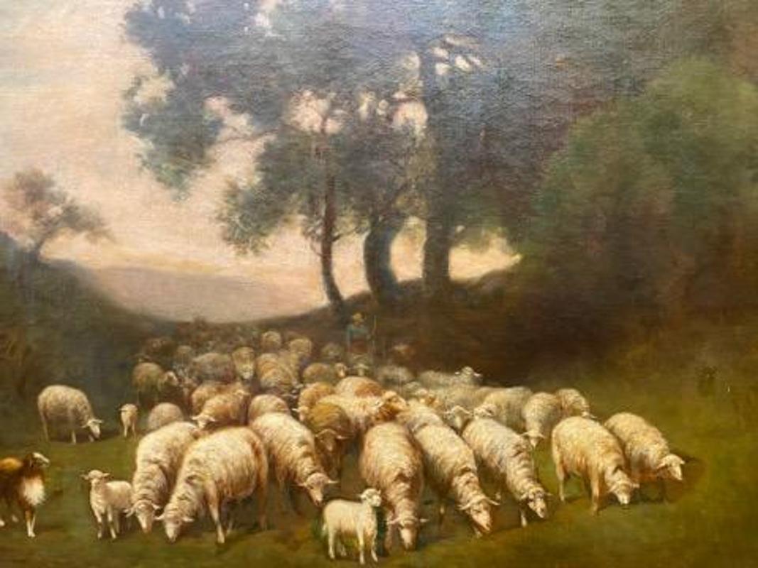 Grande huile sur toile du début du XXe siècle réalisée par l'artiste new-yorkais Charles T. Phelan représentant un troupeau de moutons dans un paysage au crépuscule. Signé et daté 1902 dans le coin inférieur gauche. Provenance : La collection de