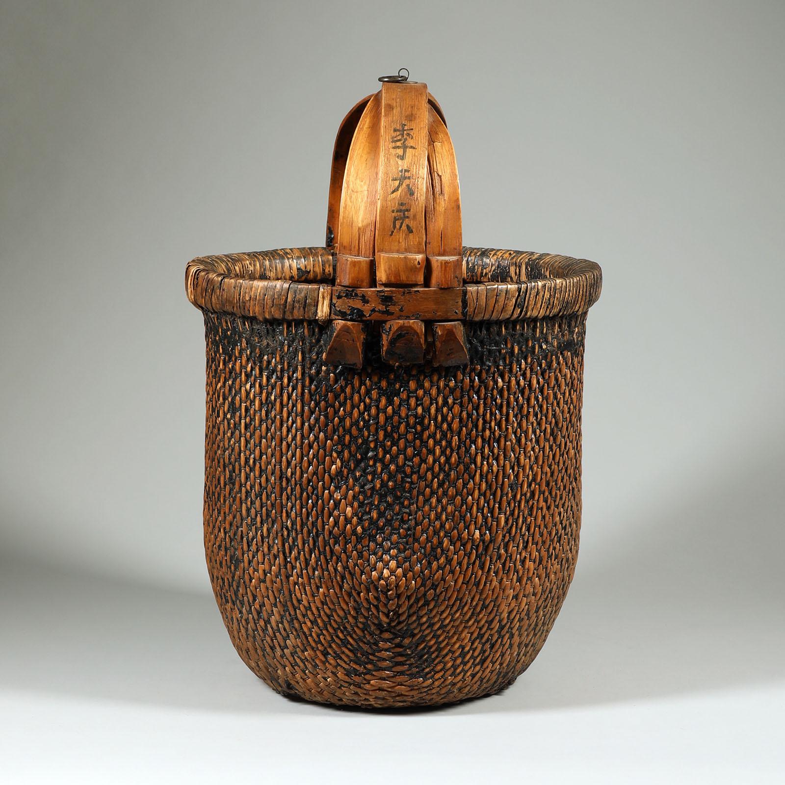 Large Early 20th Century Willow Grain Basket, China

Traditionally used to carry rice or other grains, this basket is strong and sturdy.
24 inches (60.96 cm) high by 16 inches (40.64 cm) diameter



