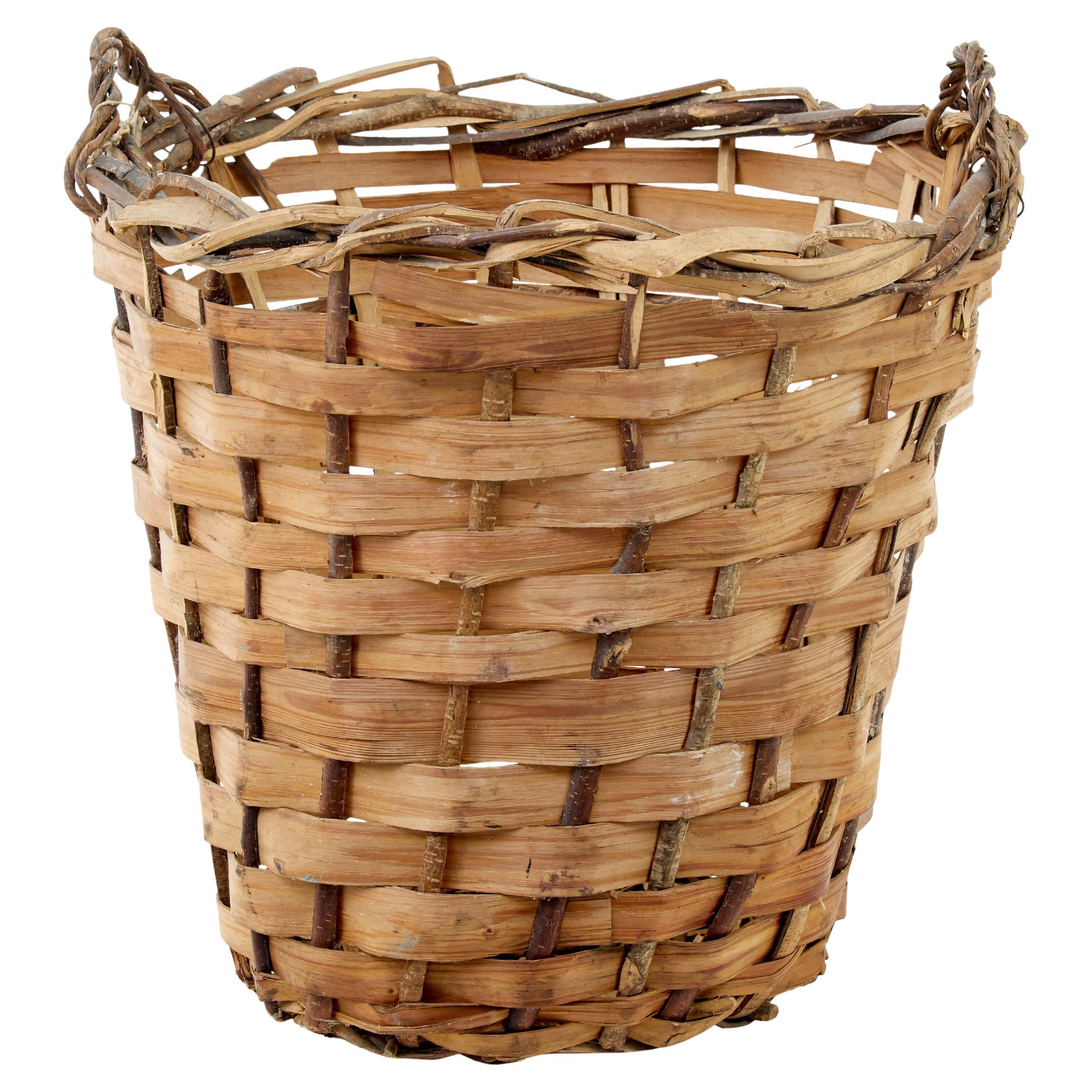 Large early 20th century woven basket For Sale
