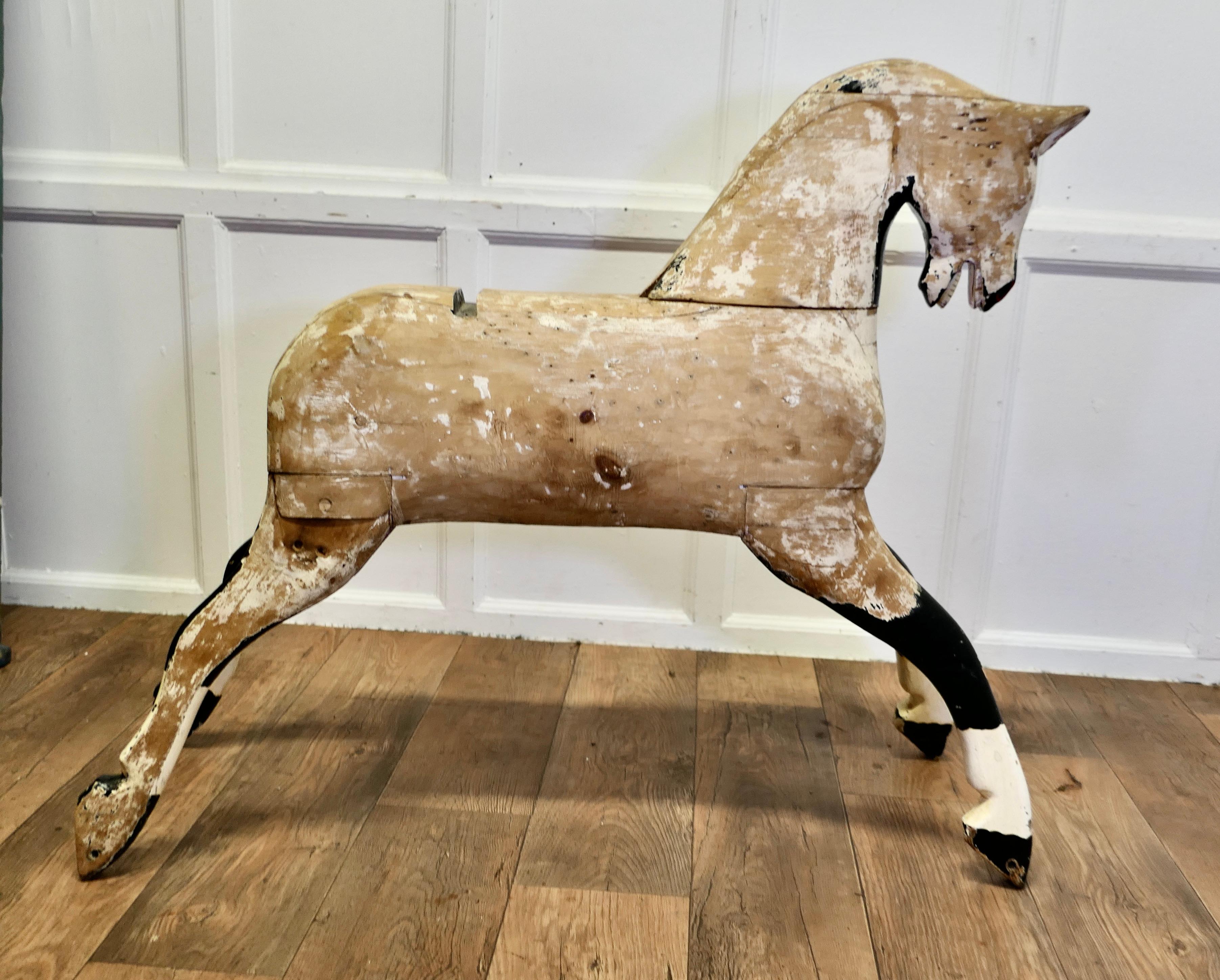 Large Early 20th.Century Pine Horse 

This is a substantial animal, he has previously been stripped back to mostly bare wood, which does help to show what sound condition he is in
He is originally from a child’s rocking Horse he has a good carved