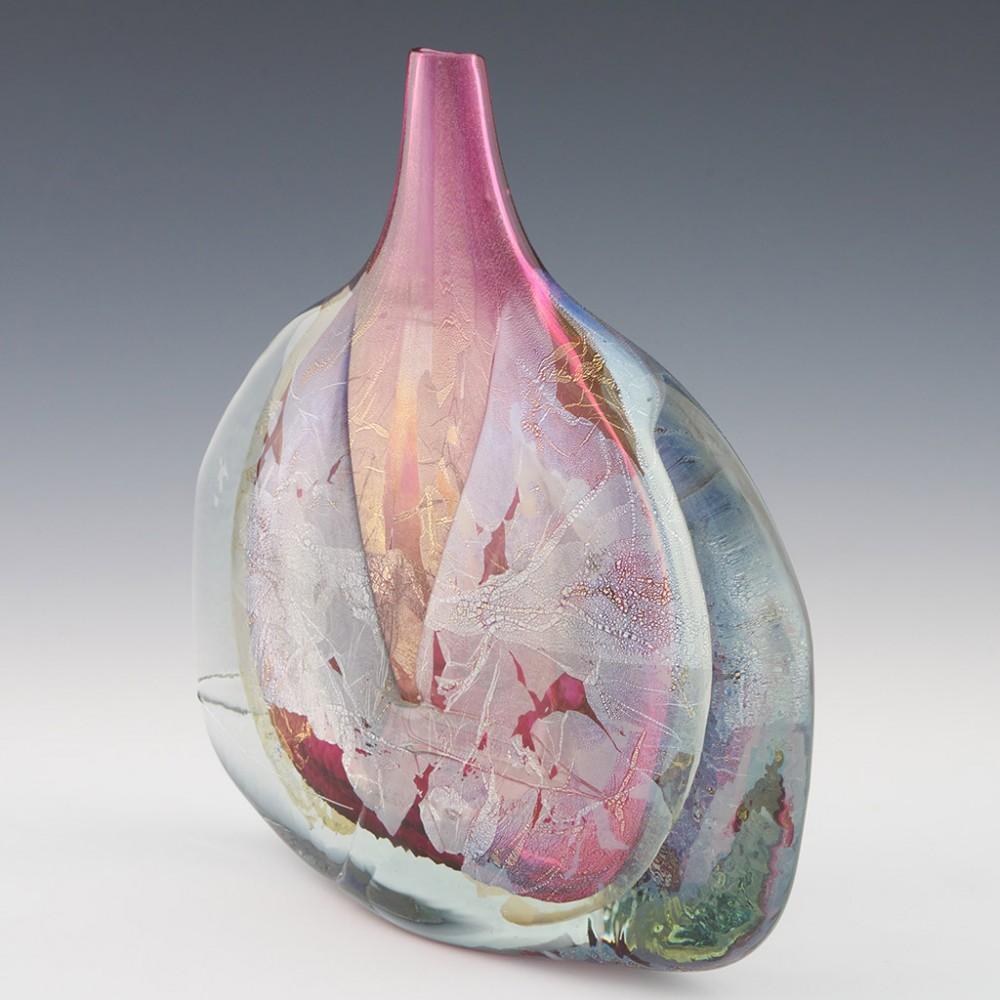 Heading : Large Early Azurene Pink 'Fish' vase made by Michael Harris
Date : 1981/2
Origin : Isle of Wight
Marks : Signed Michael Harris Isle of Wight England
Type : Lead
Size : 26.5cm height, 25.5cm width
Condition : Excellent, no chips or