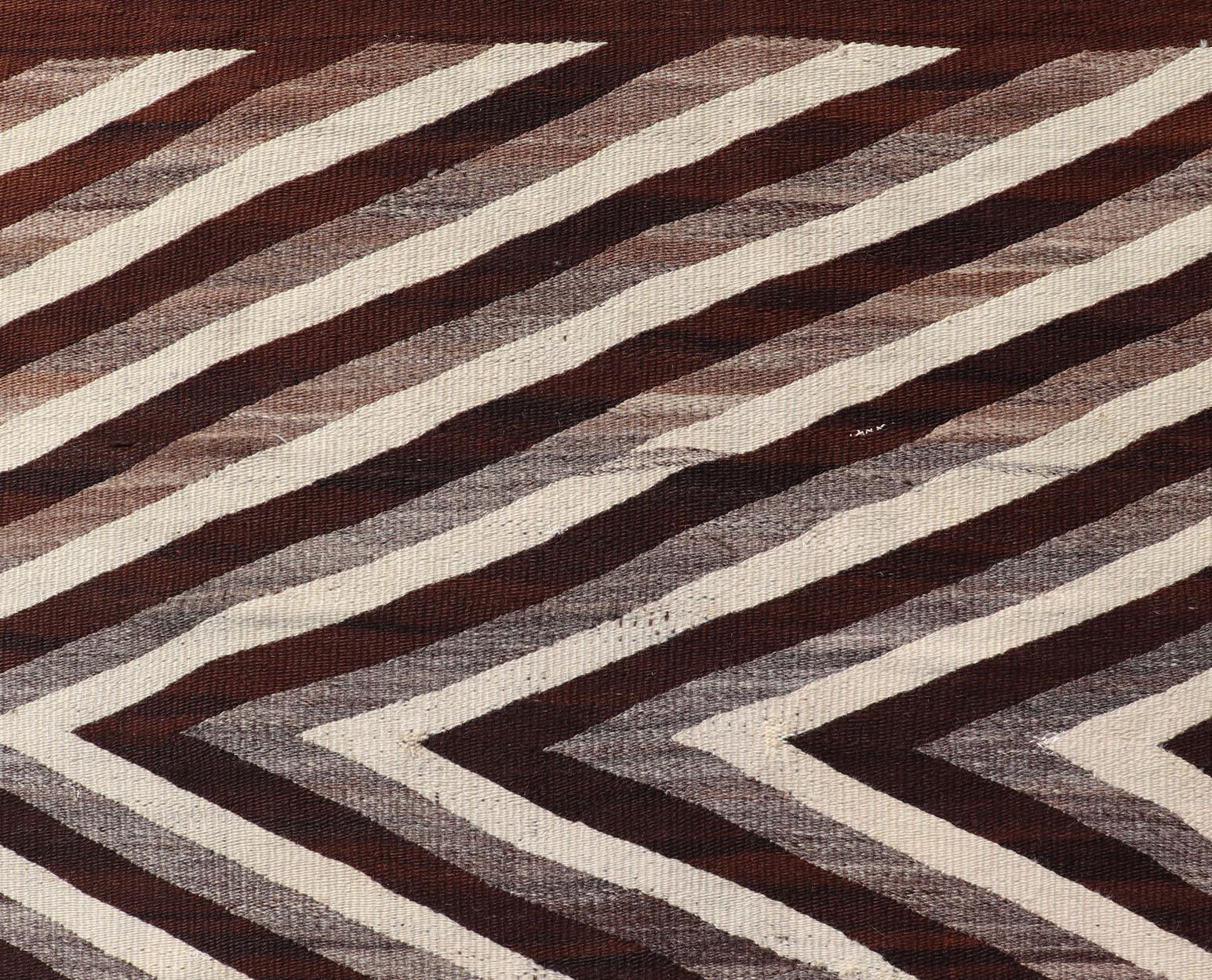 American Large Early Navajo Tribal Rug with Large Zig-Zag Design in Brown, Ivory For Sale